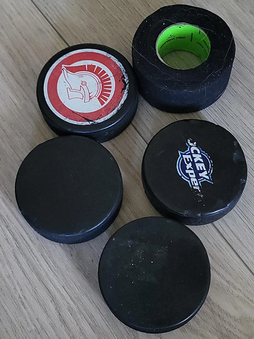 4 Hockey Pucks & Hockey Tape
