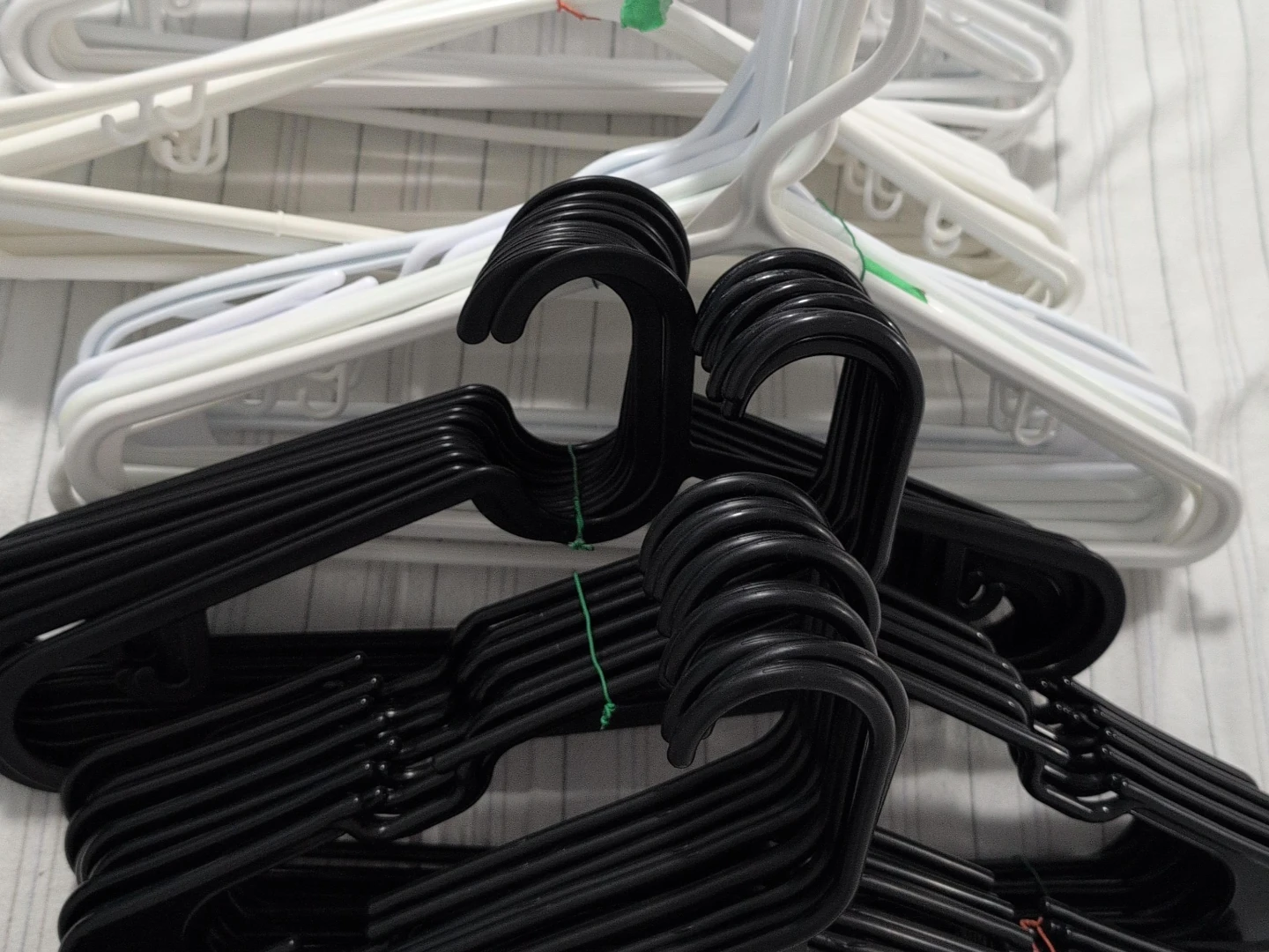 Lot of 70 Plastic Hangers (30 Black, 40 White)