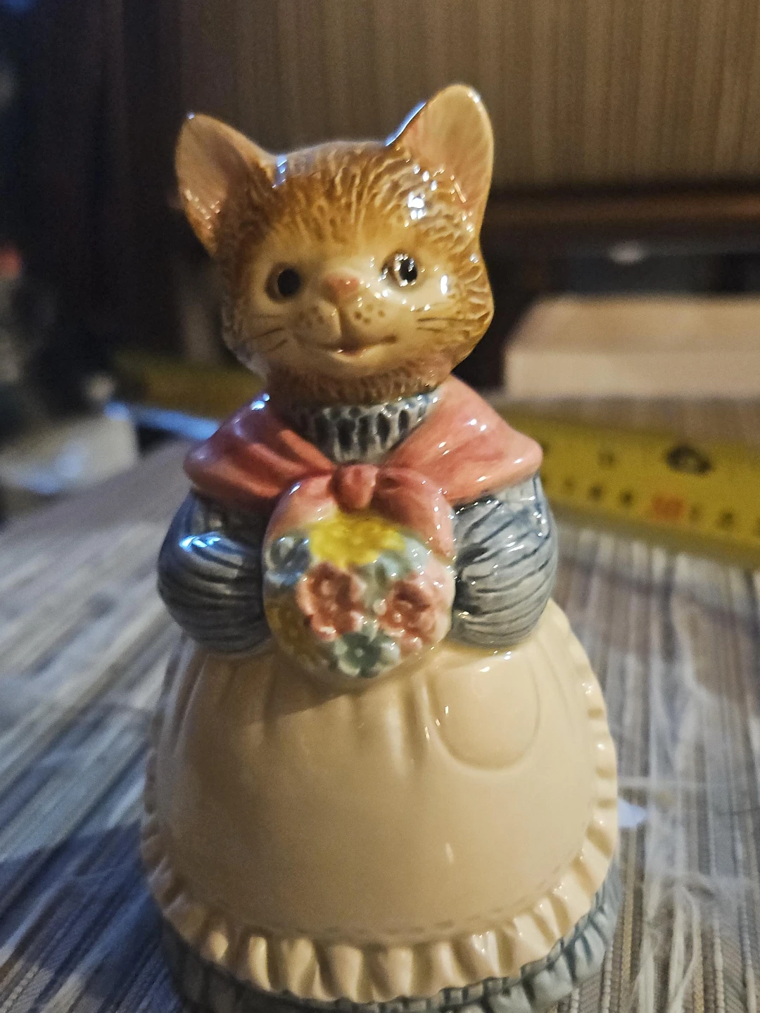 Ceramic Figurine of a Cat Holding Flowers