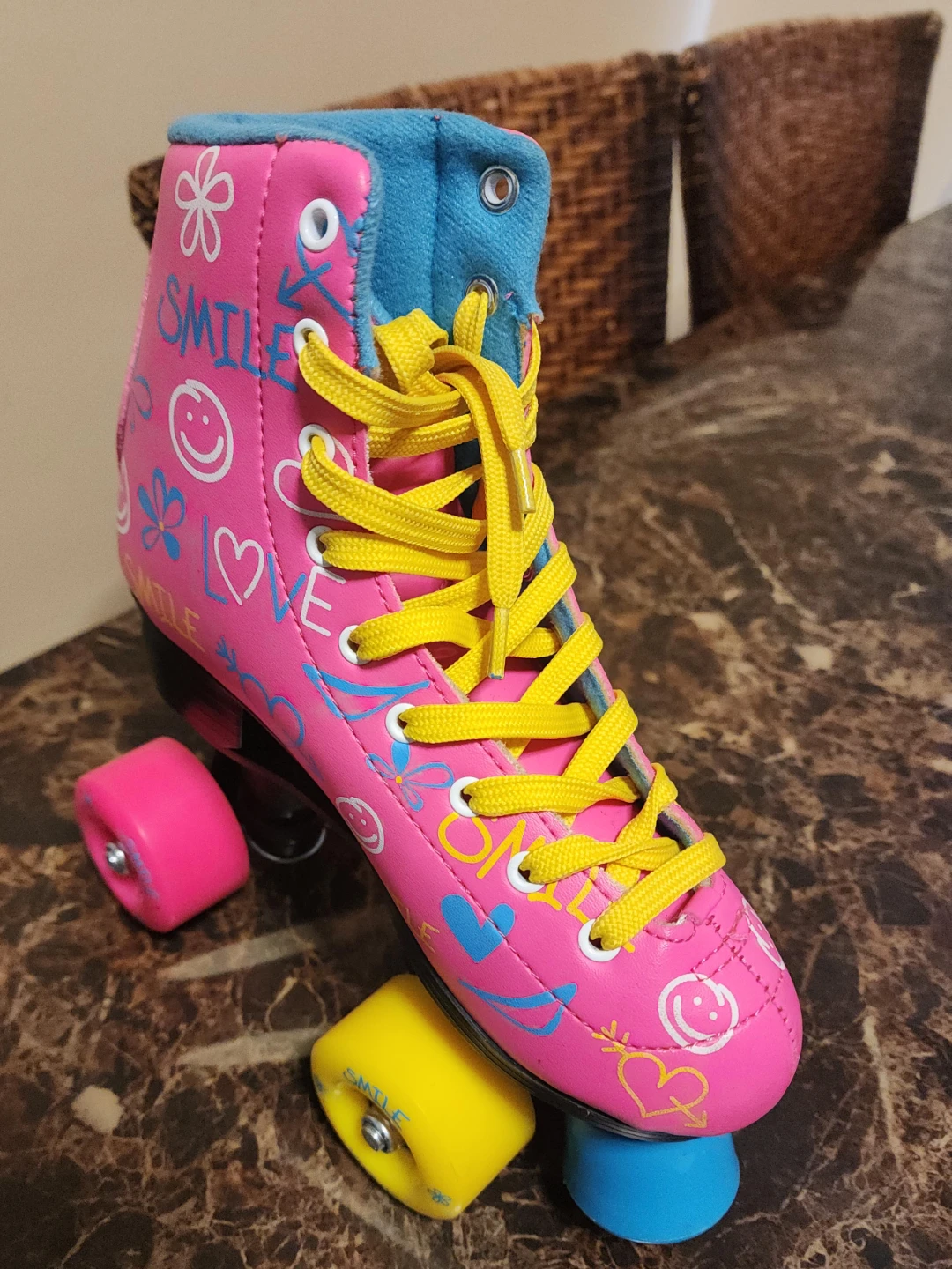 Pink Roller Skates with Yellow Laces