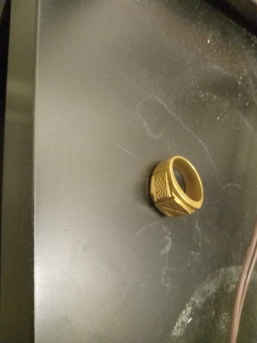 Gold coloured signet ring