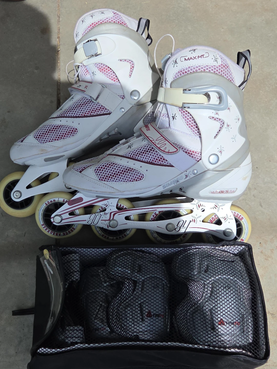 White and Pink Rollerblades with Protective Gear
