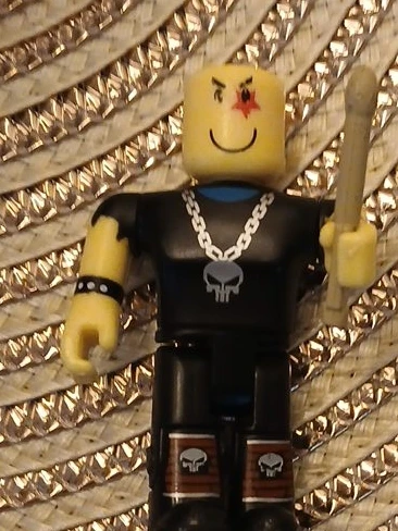 Roblox figure with drumstick