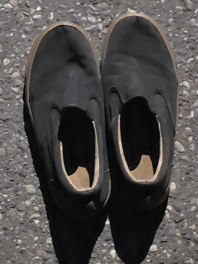 Black slip-on shoes with gum sole