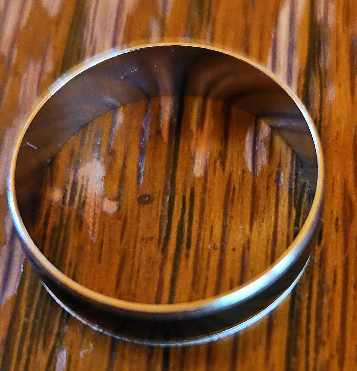 Silver colored metal bangle bracelet