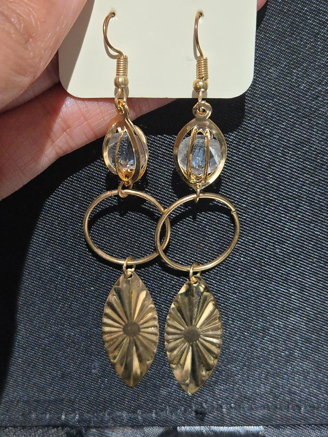 Gold tone dangle earrings