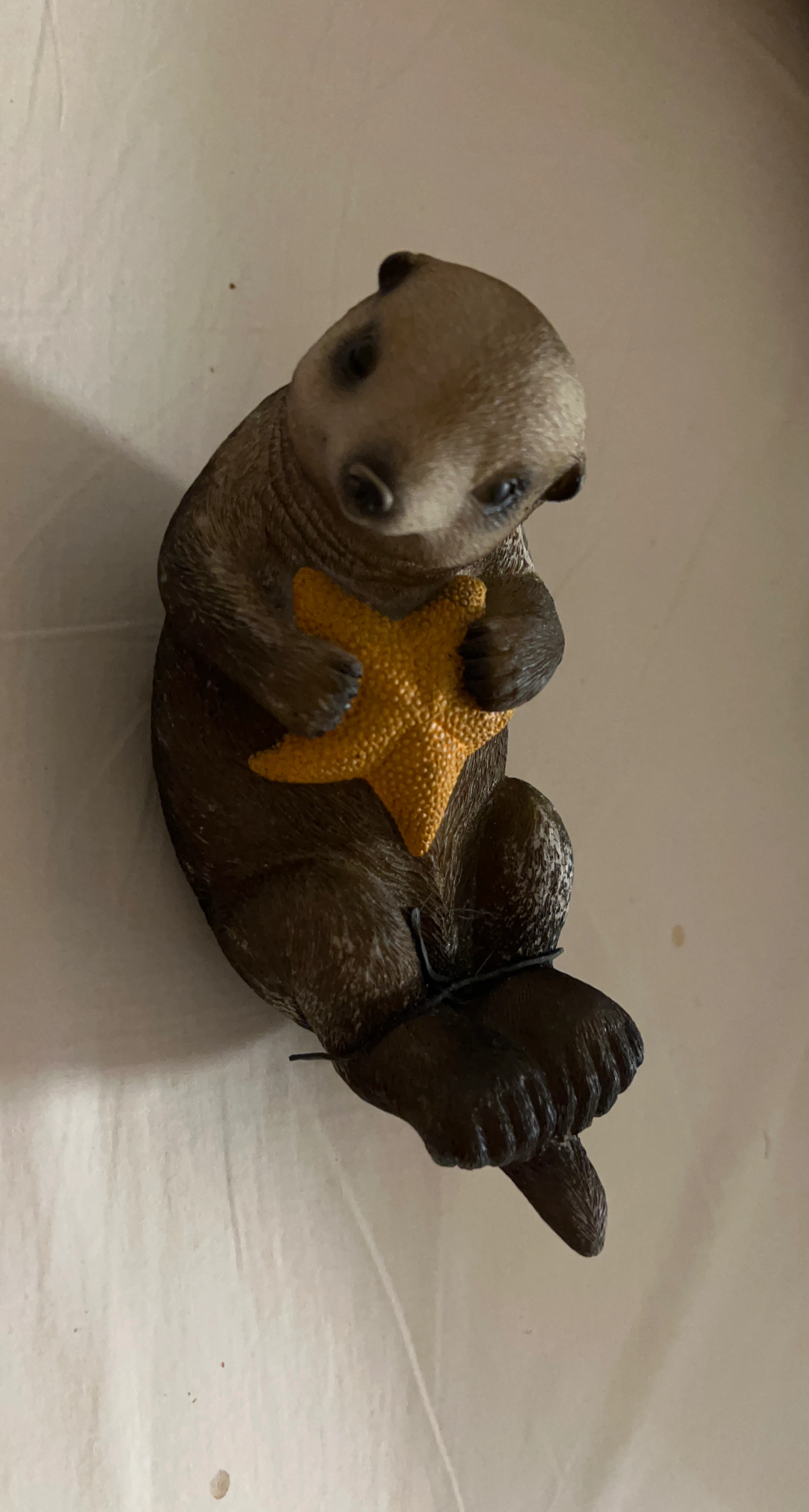 Sea Otter Figurine with Starfish