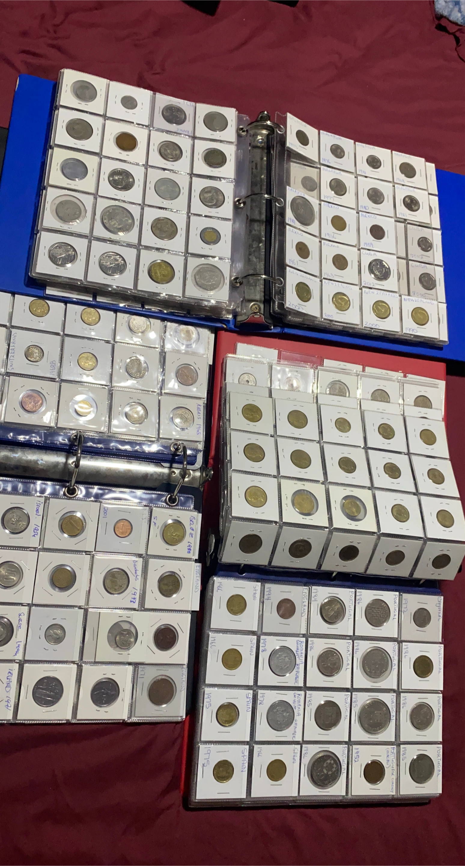Vintage Collection of Foreign Coins in Binders