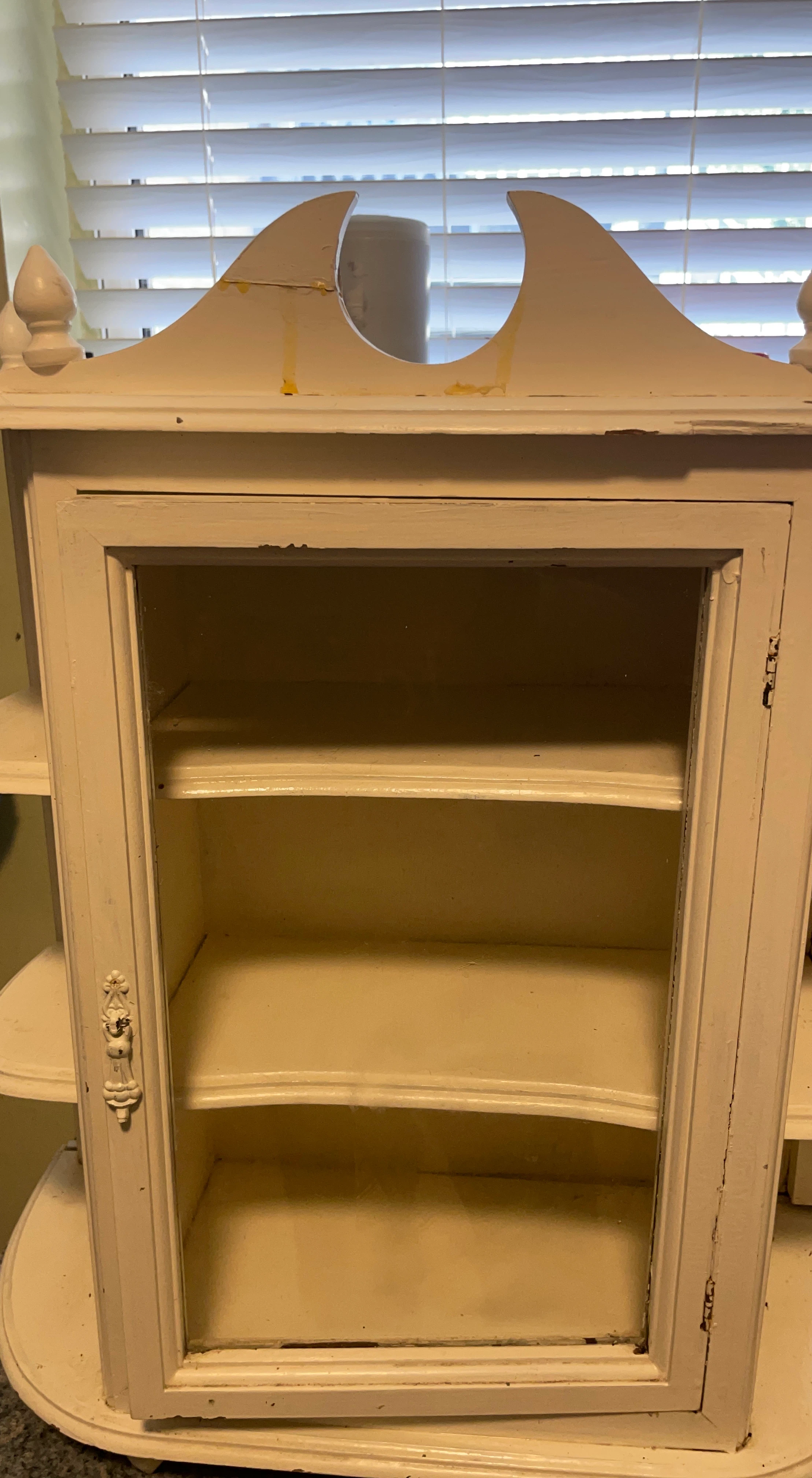 Cream Colored Wall Cabinet with Glass Door