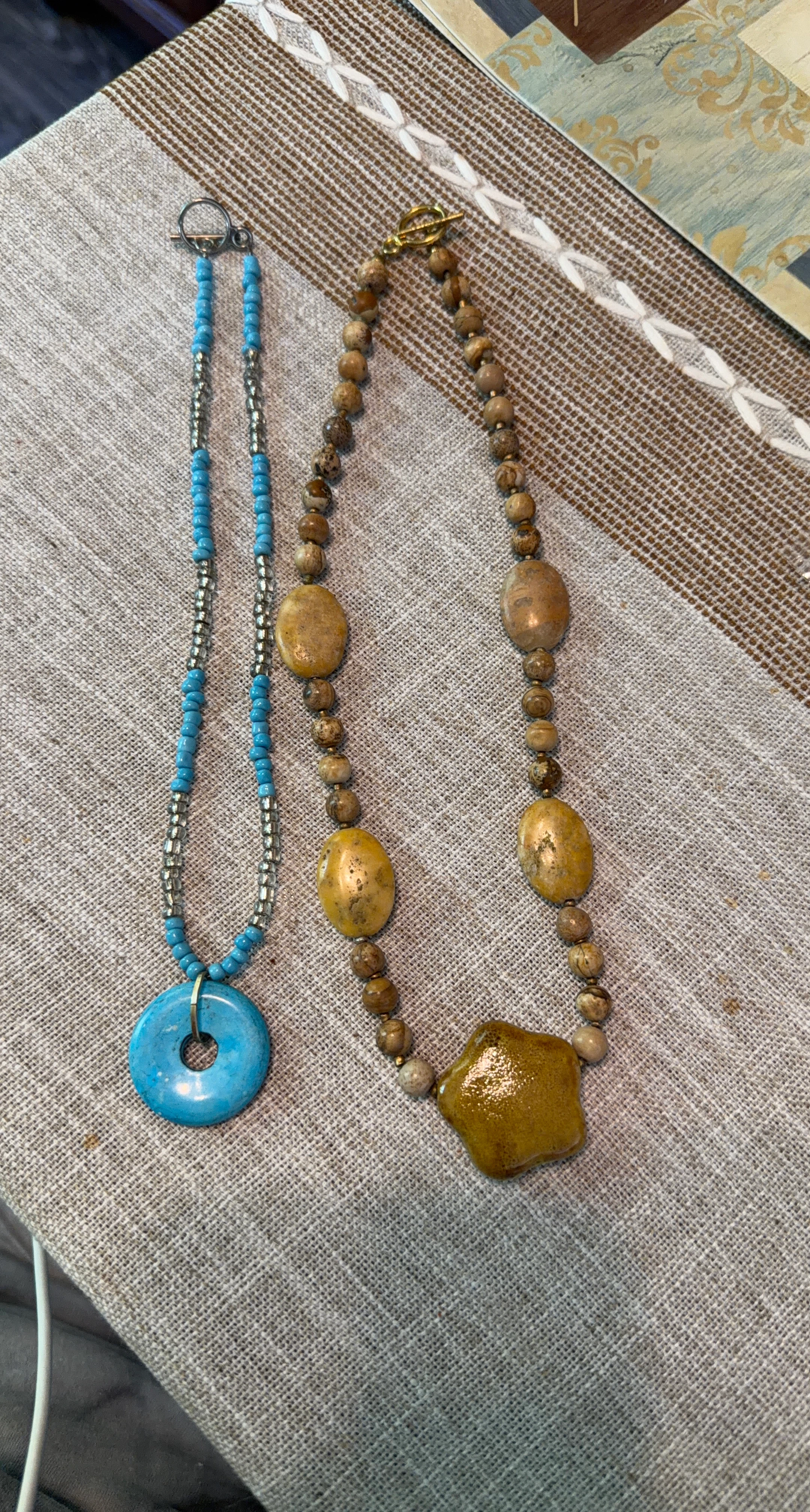 Two Beaded Necklaces with Pendants