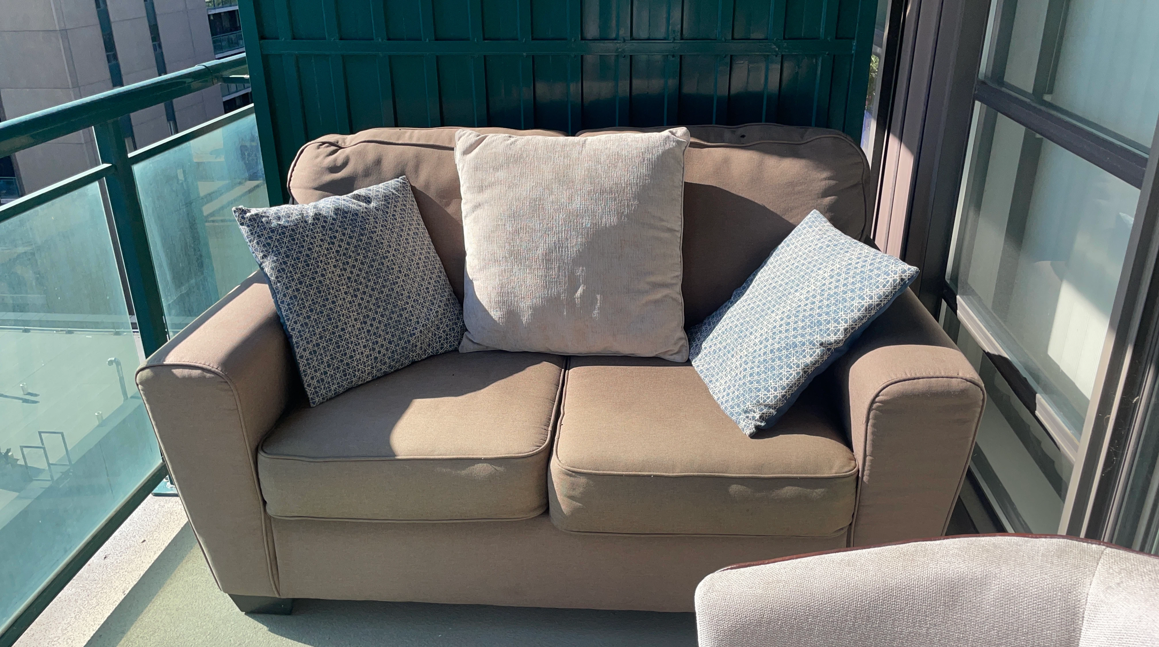 Brown Loveseat Sofa with Accent Pillows