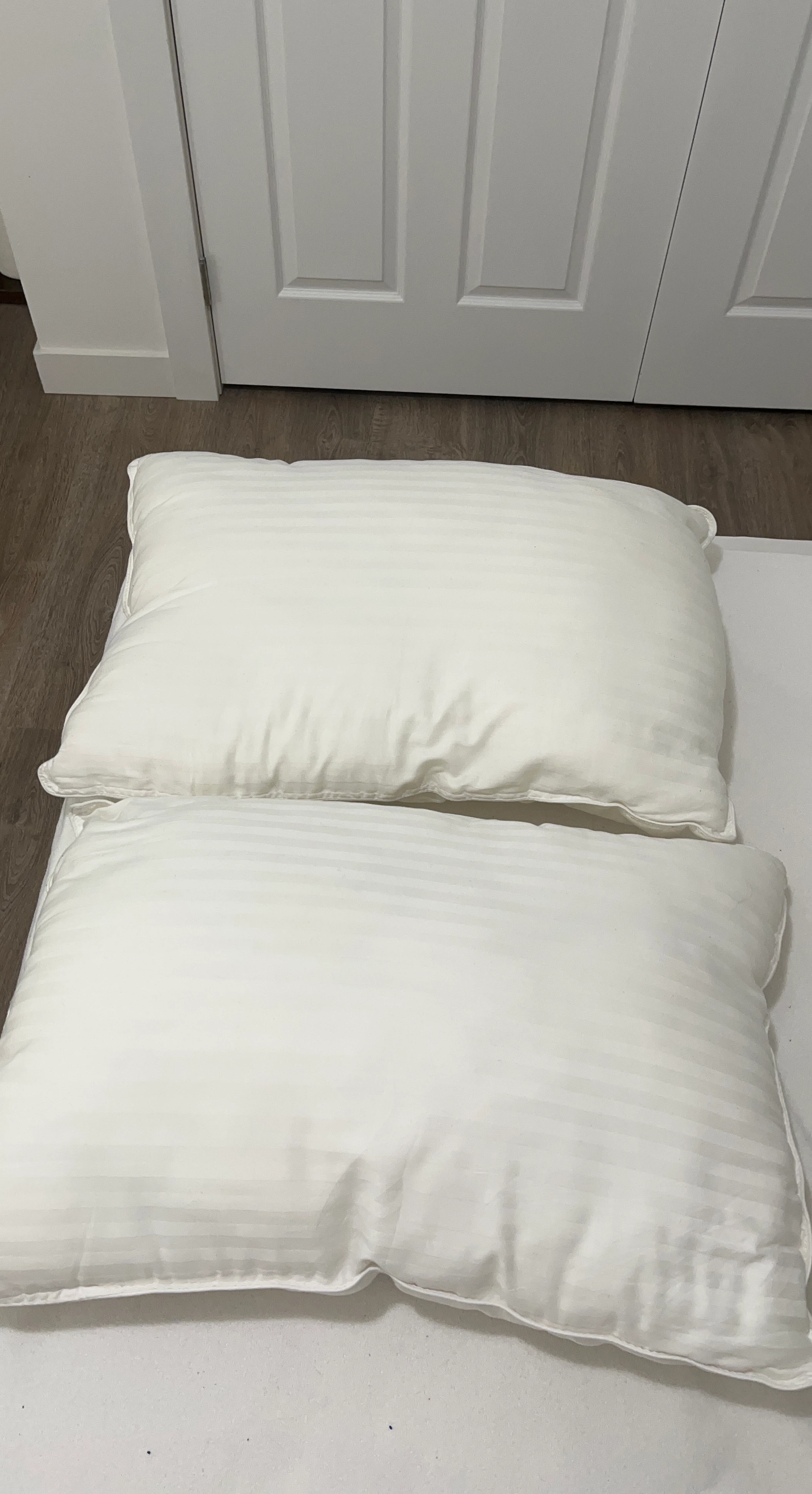 Two White Striped Pillows