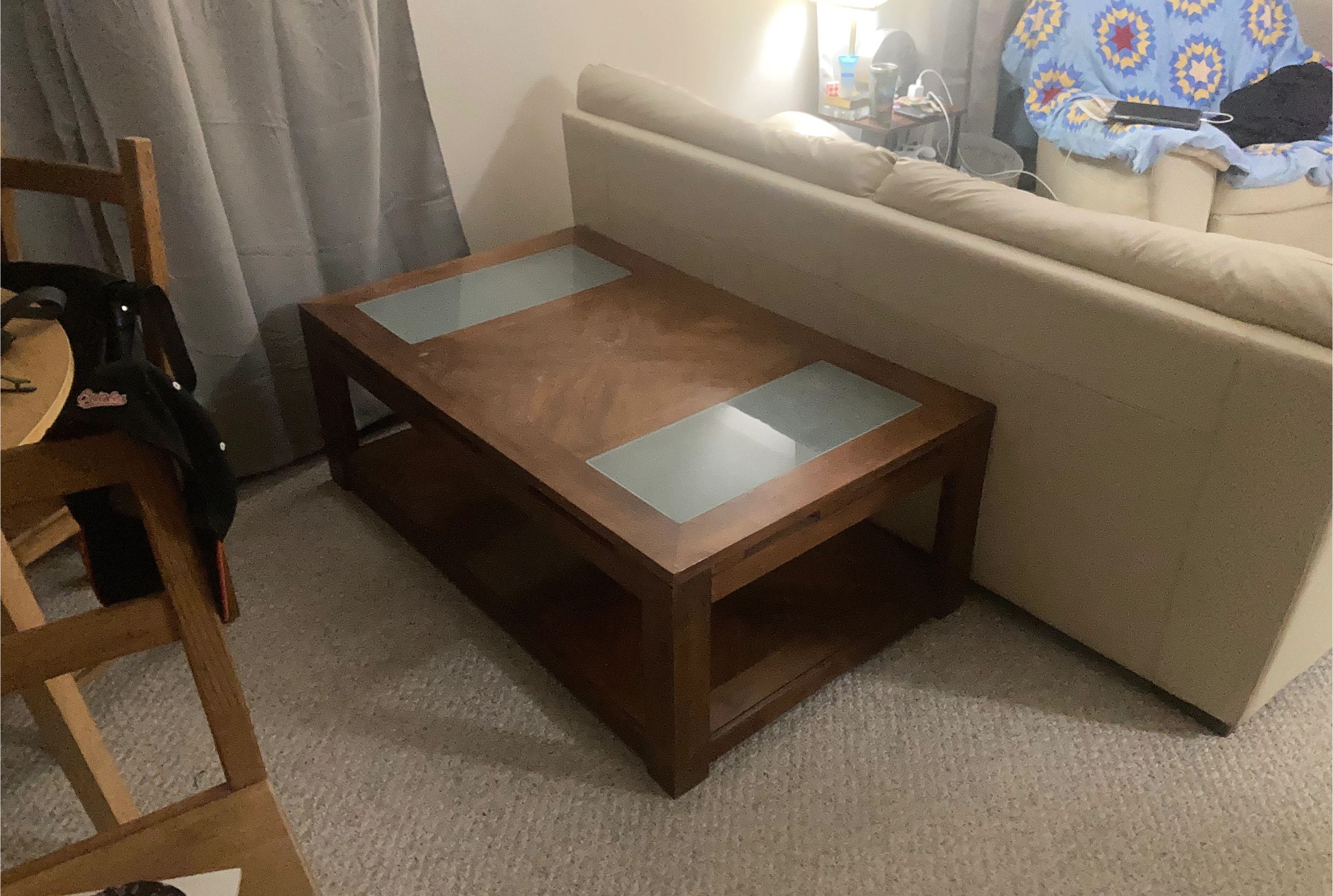 Wooden coffee table with glass insets