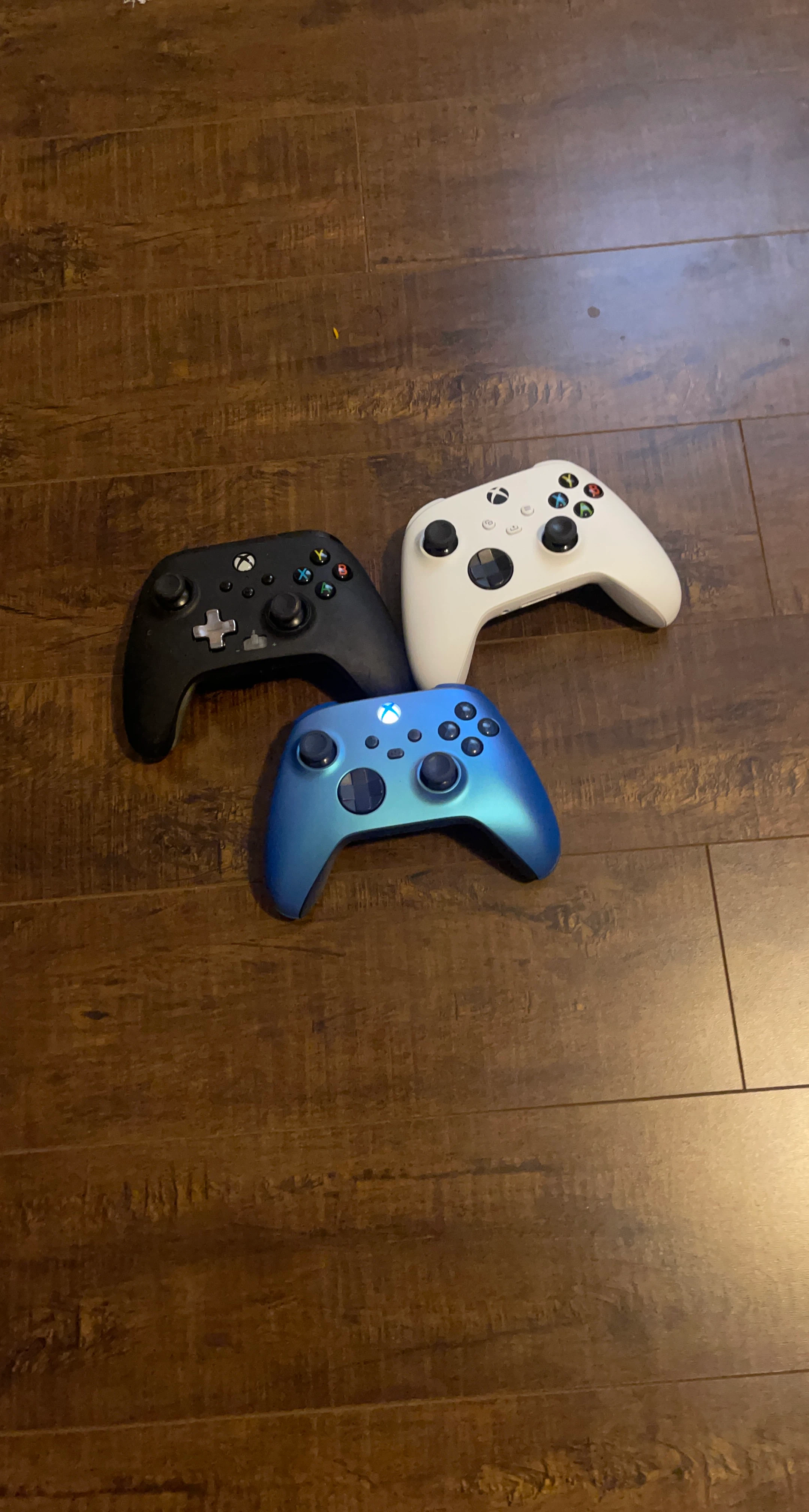 Xbox Wireless Controllers - Black, White, and Blue