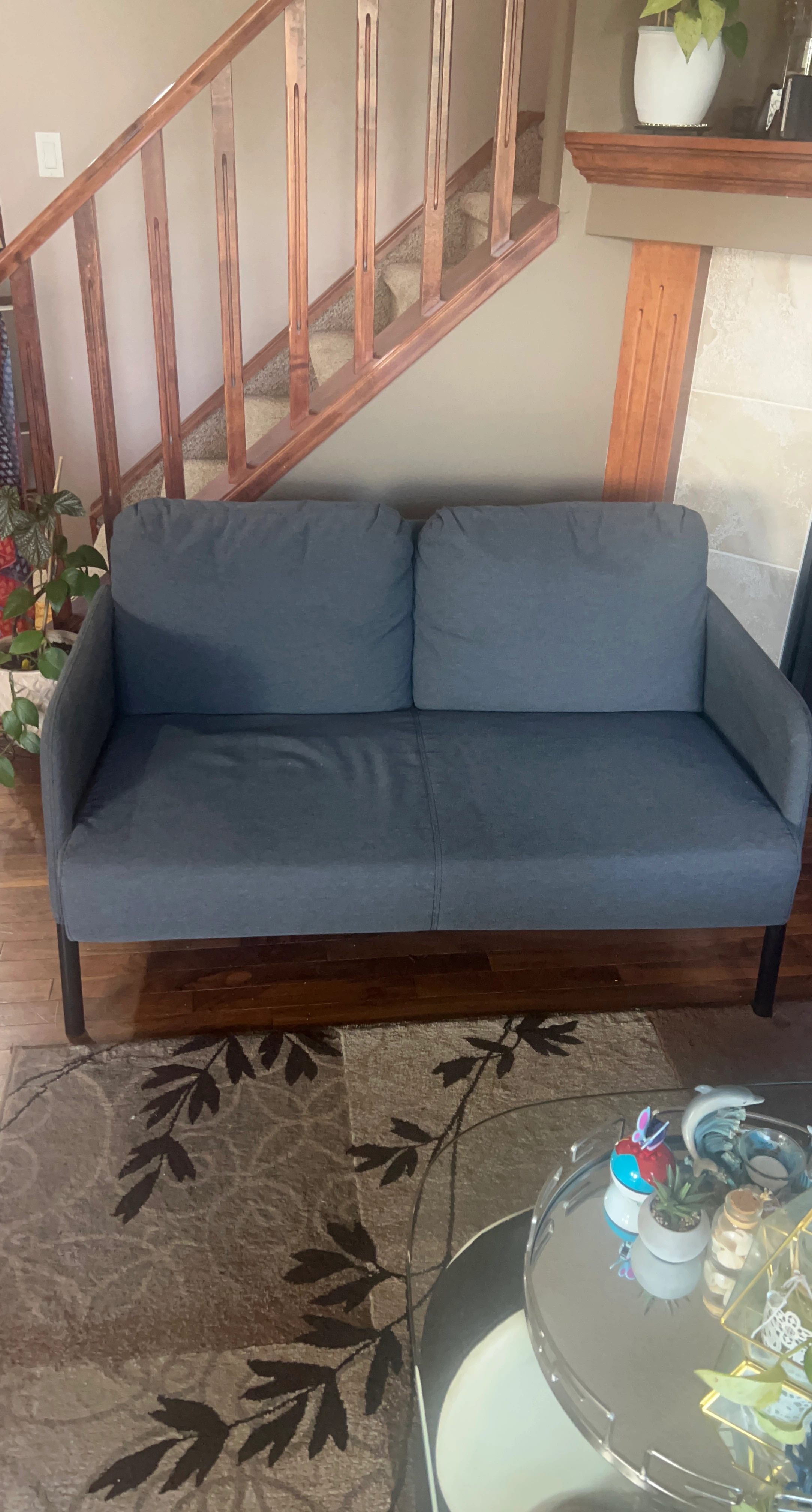 Grey two-seater sofa