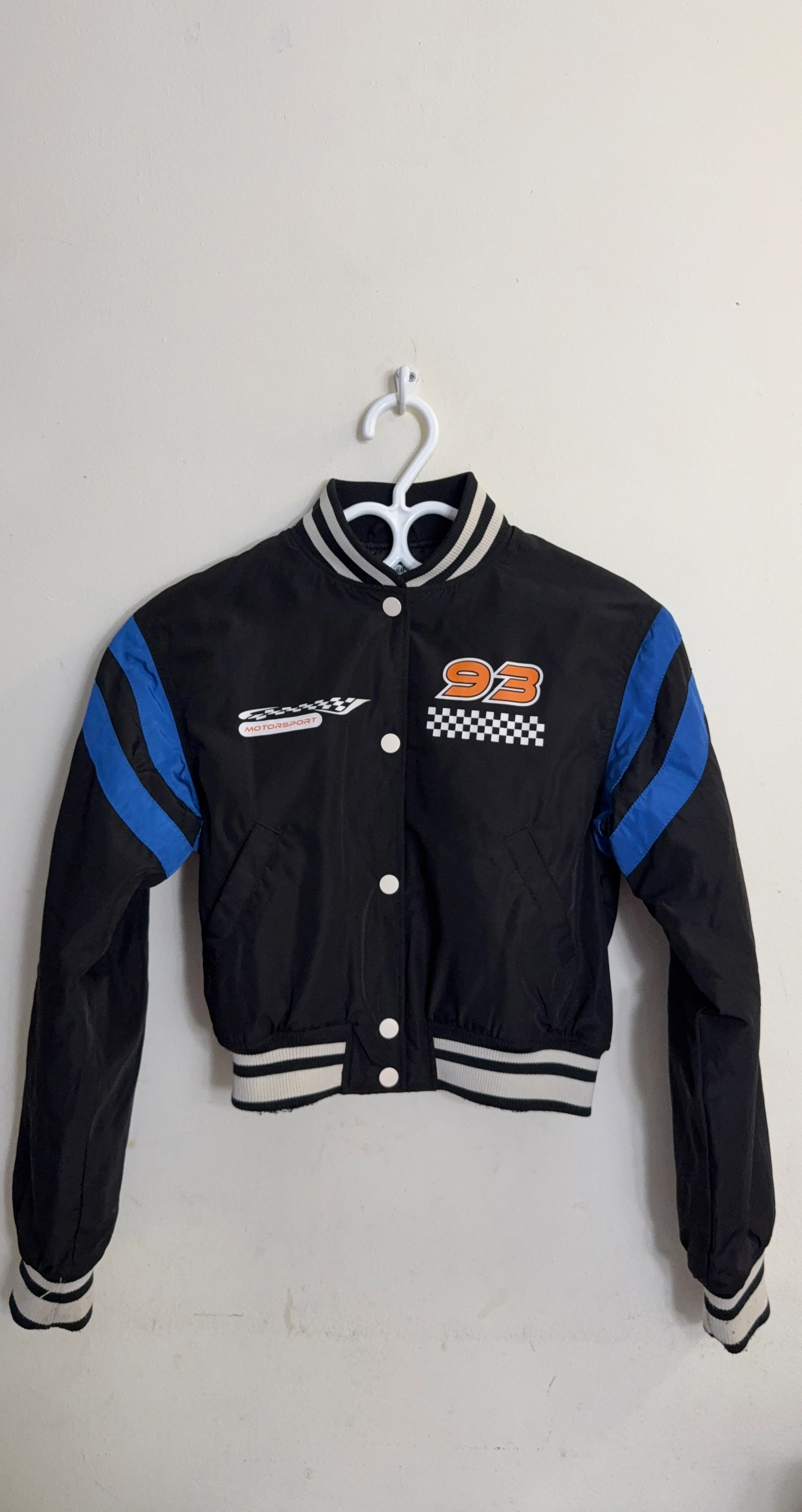 H&M Black Bomber Jacket with "93" Graphic - Size 10-11Y