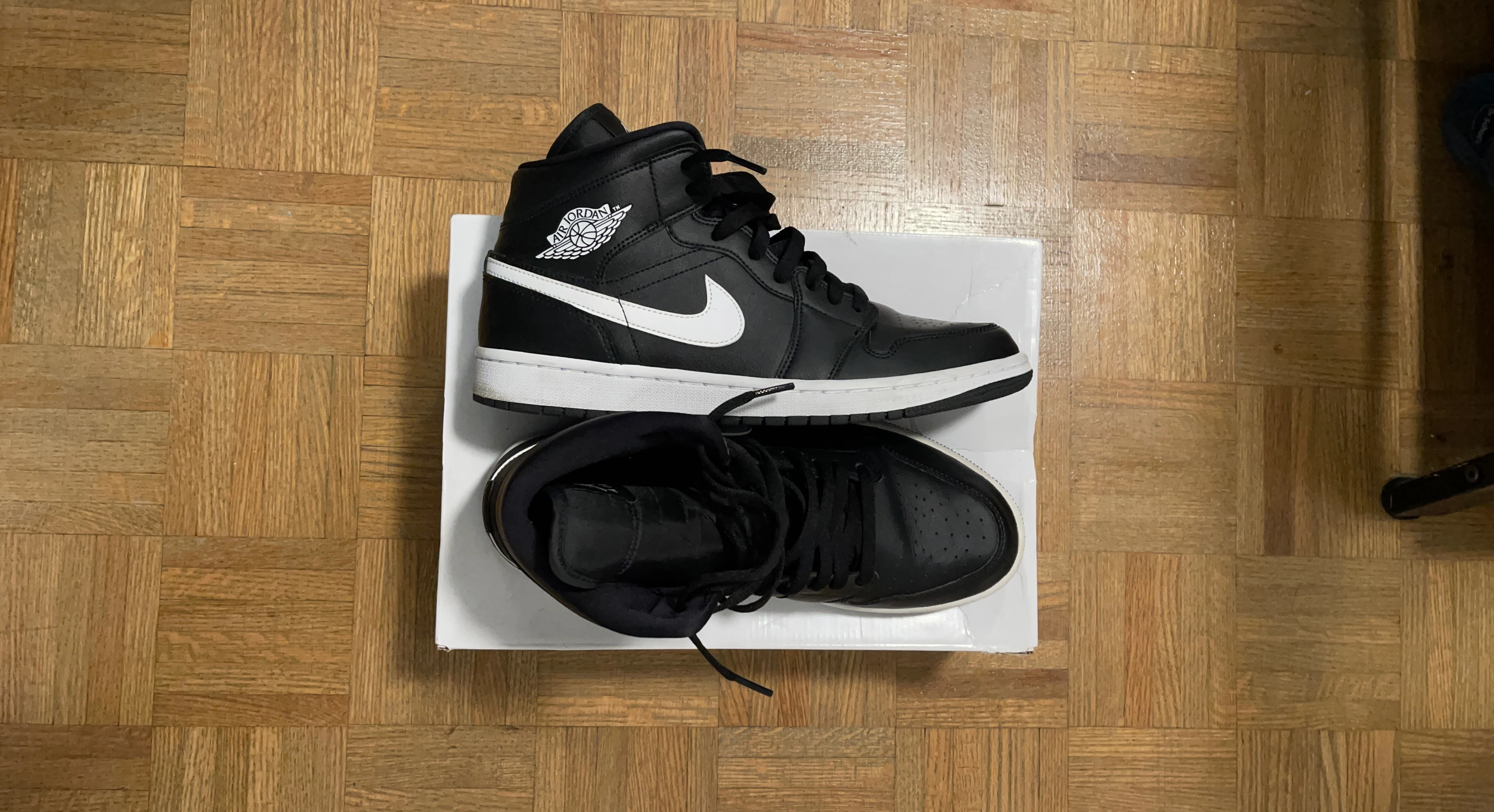 Air Jordan 1 Mid Black White Sneakers