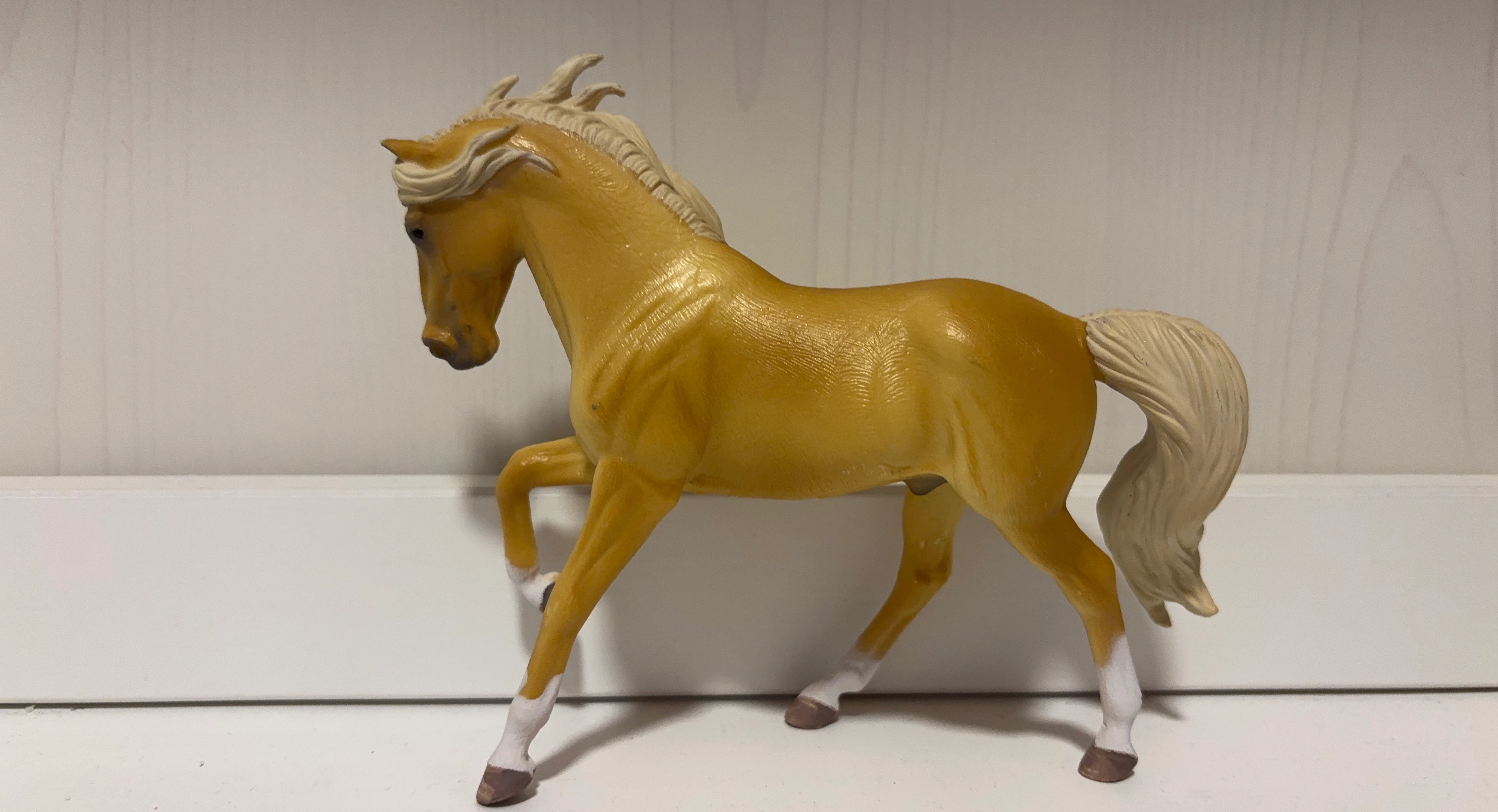 Detailed horse figurine with lush hair