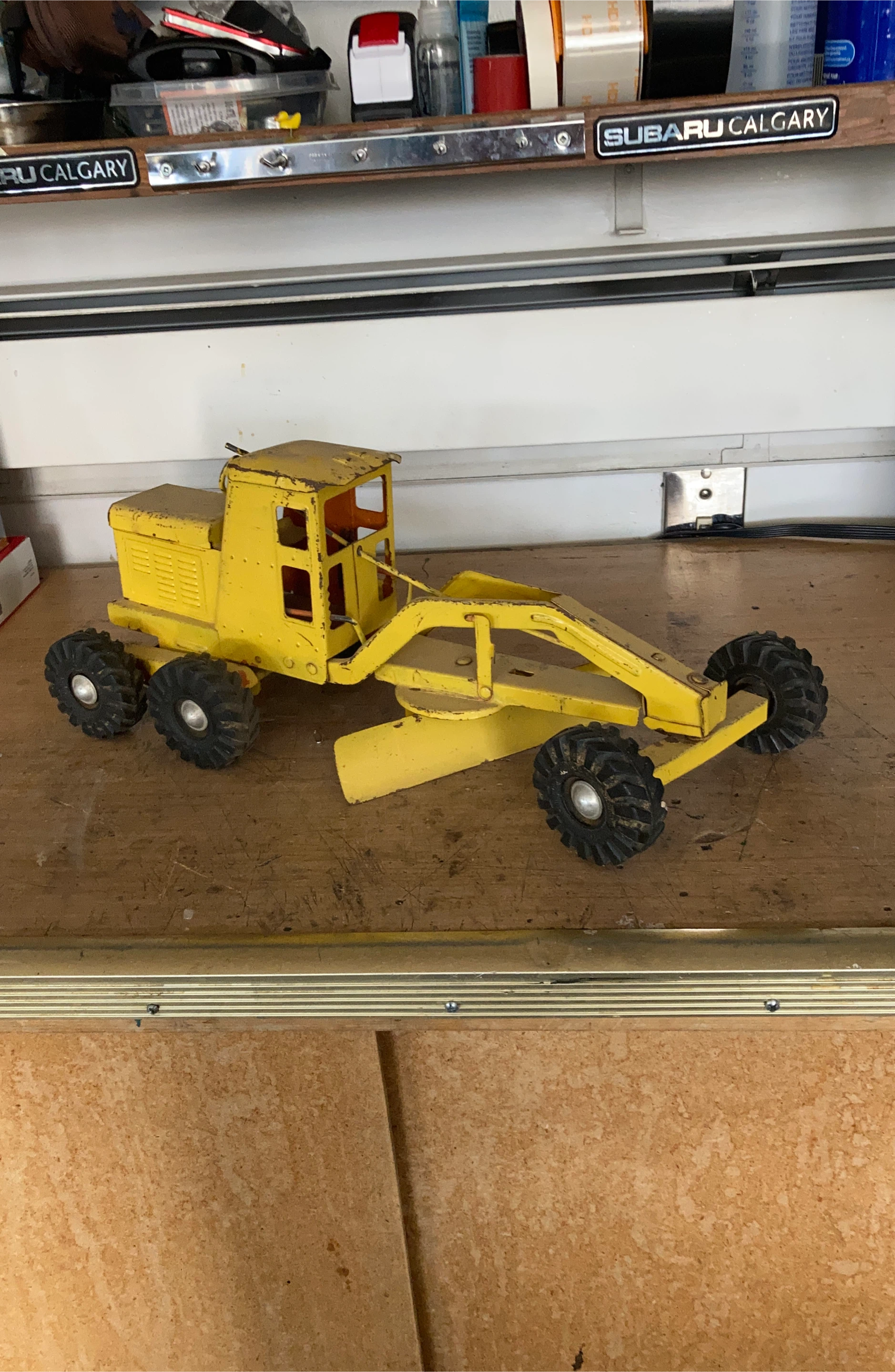 Yellow Metal Toy Grader