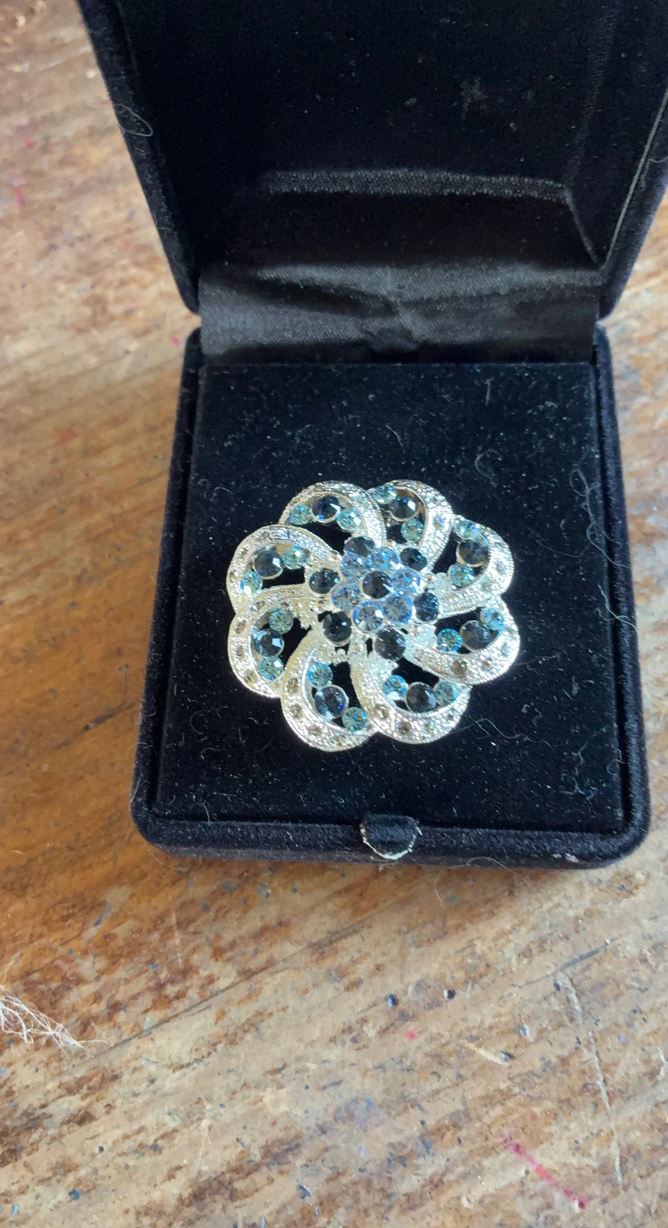 Sparkling Flower Brooch with Blue and Clear Crystals