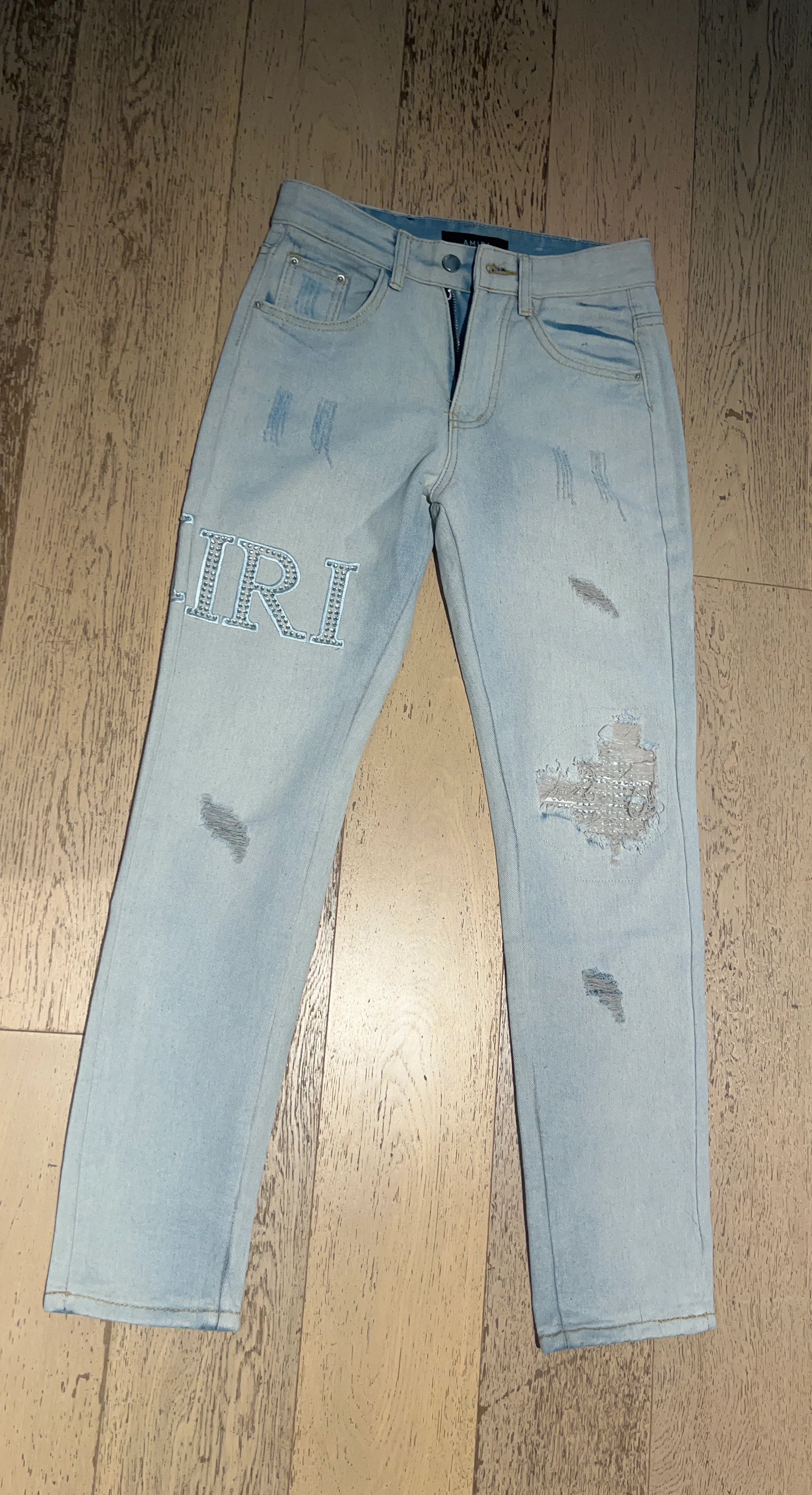 AMIRI Light Wash Distressed Jeans