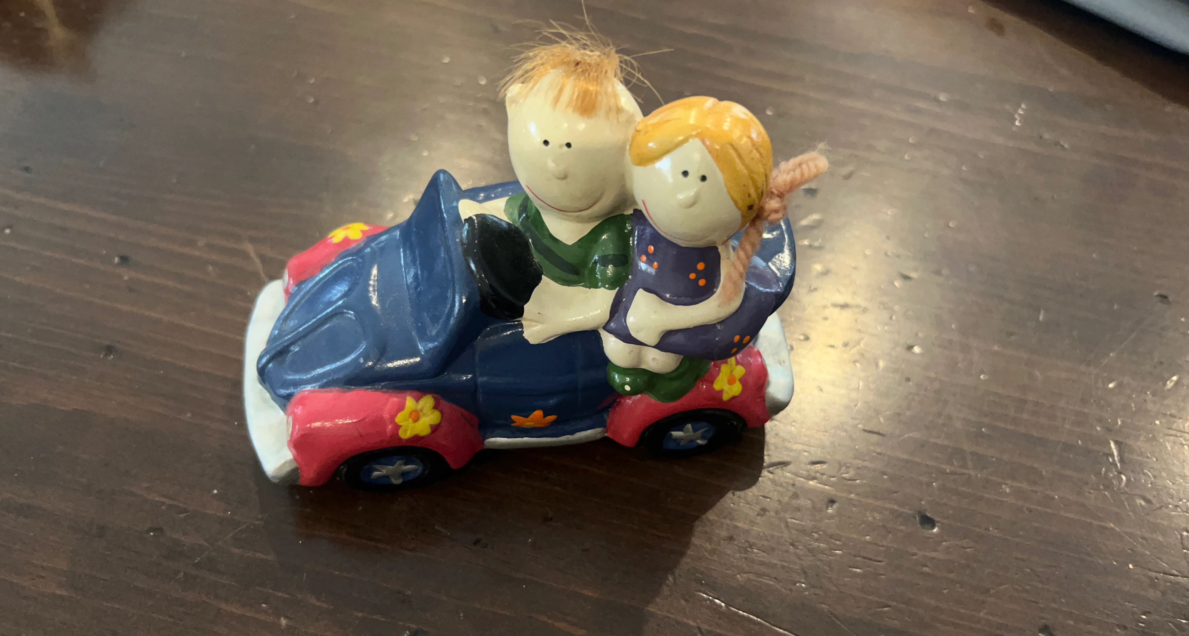 Figurine of two people in a car