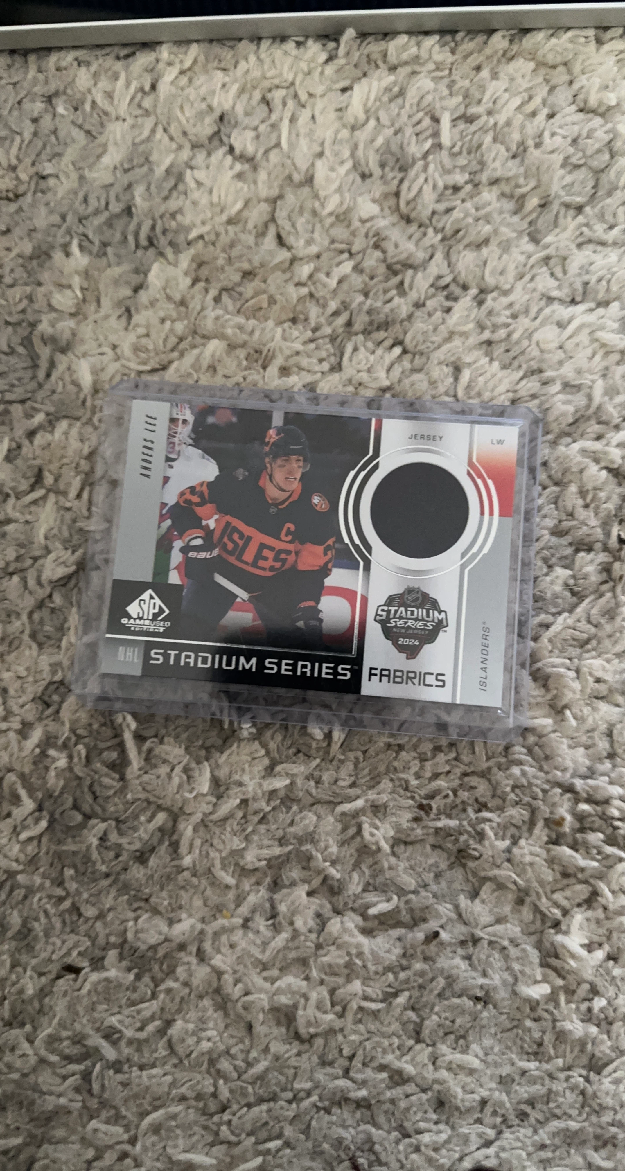 2024 NHL Stadium Series Fabrics Hockey Card - Andrew Lee