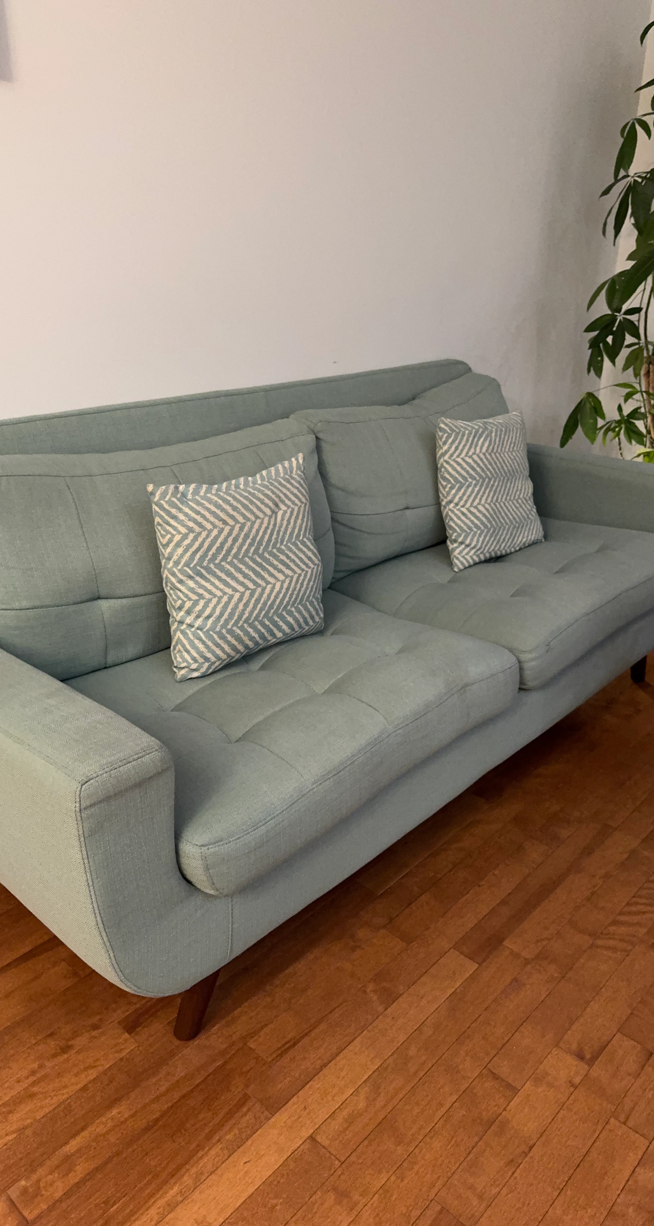 Light Blue Sofa with Pillows