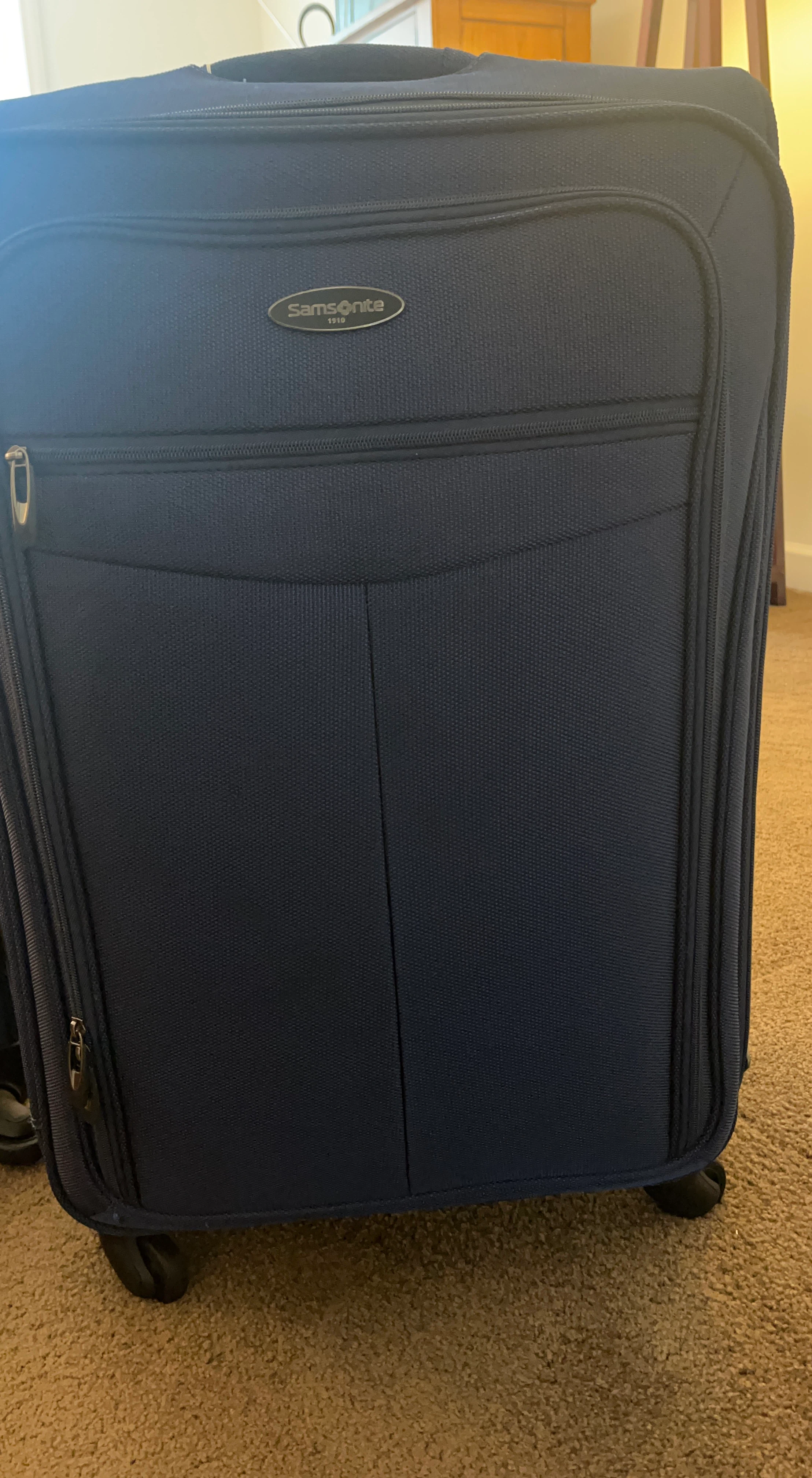 Samsonite Navy Blue Rolling Suitcase