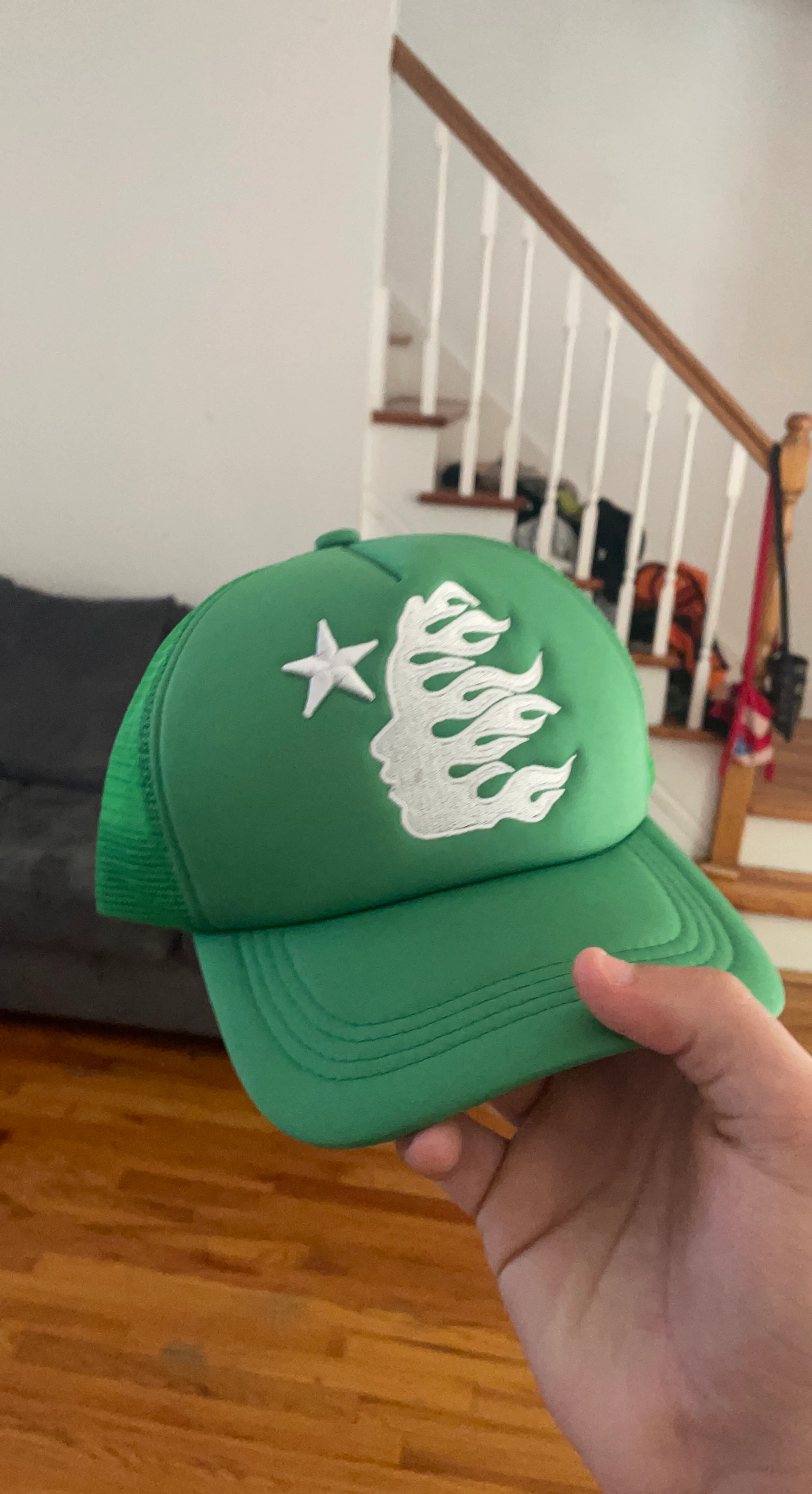 Green Trucker Hat with White Flame and Star Design