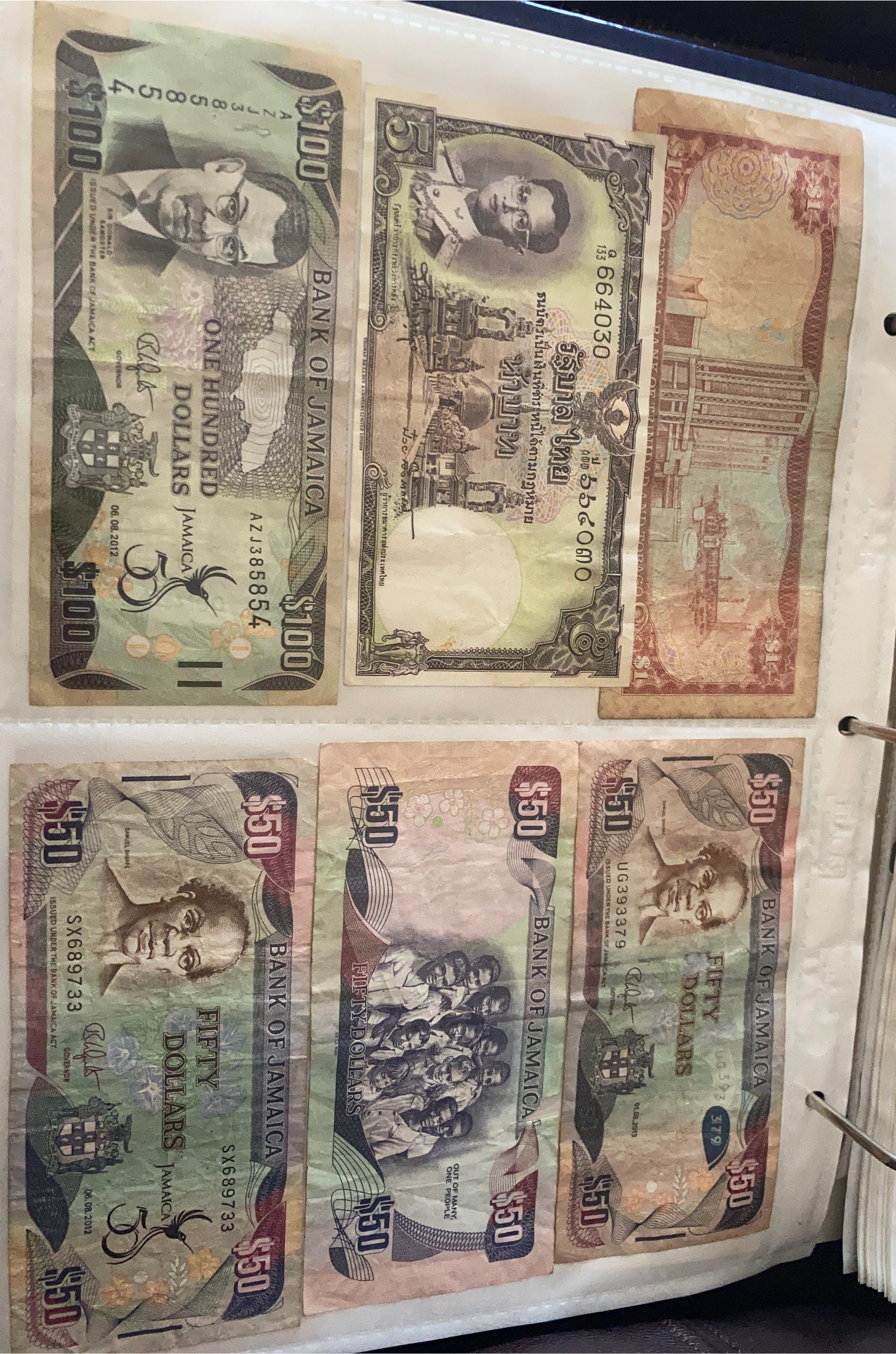 Bank of Jamaica $100 and $50 Bills