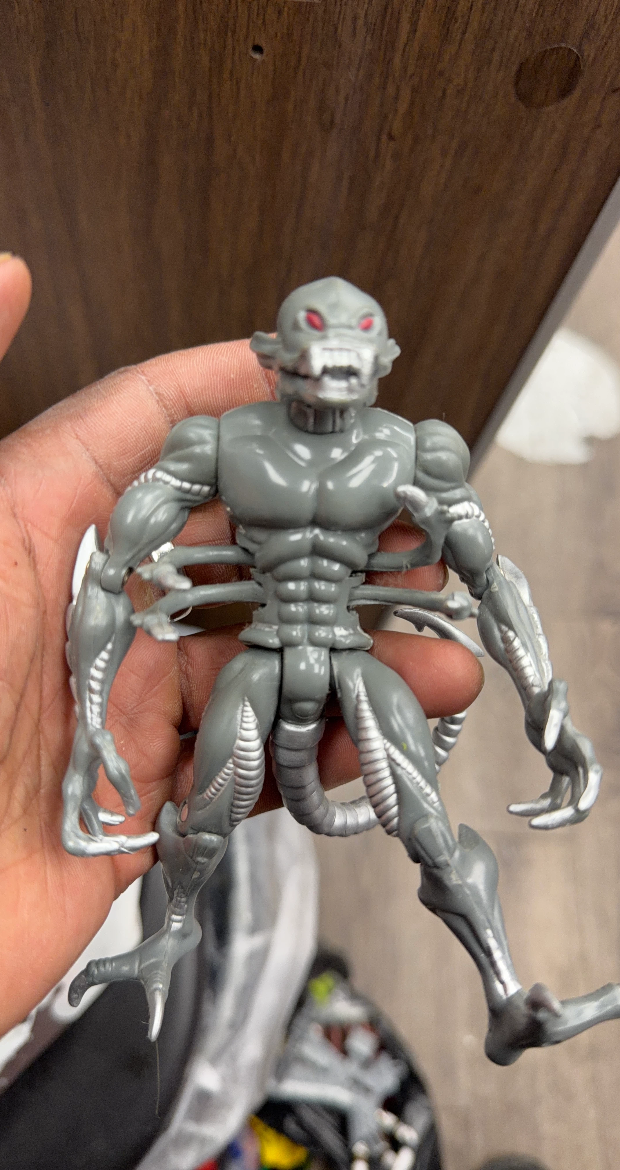 Gray Monster Action Figure with Red Eyes