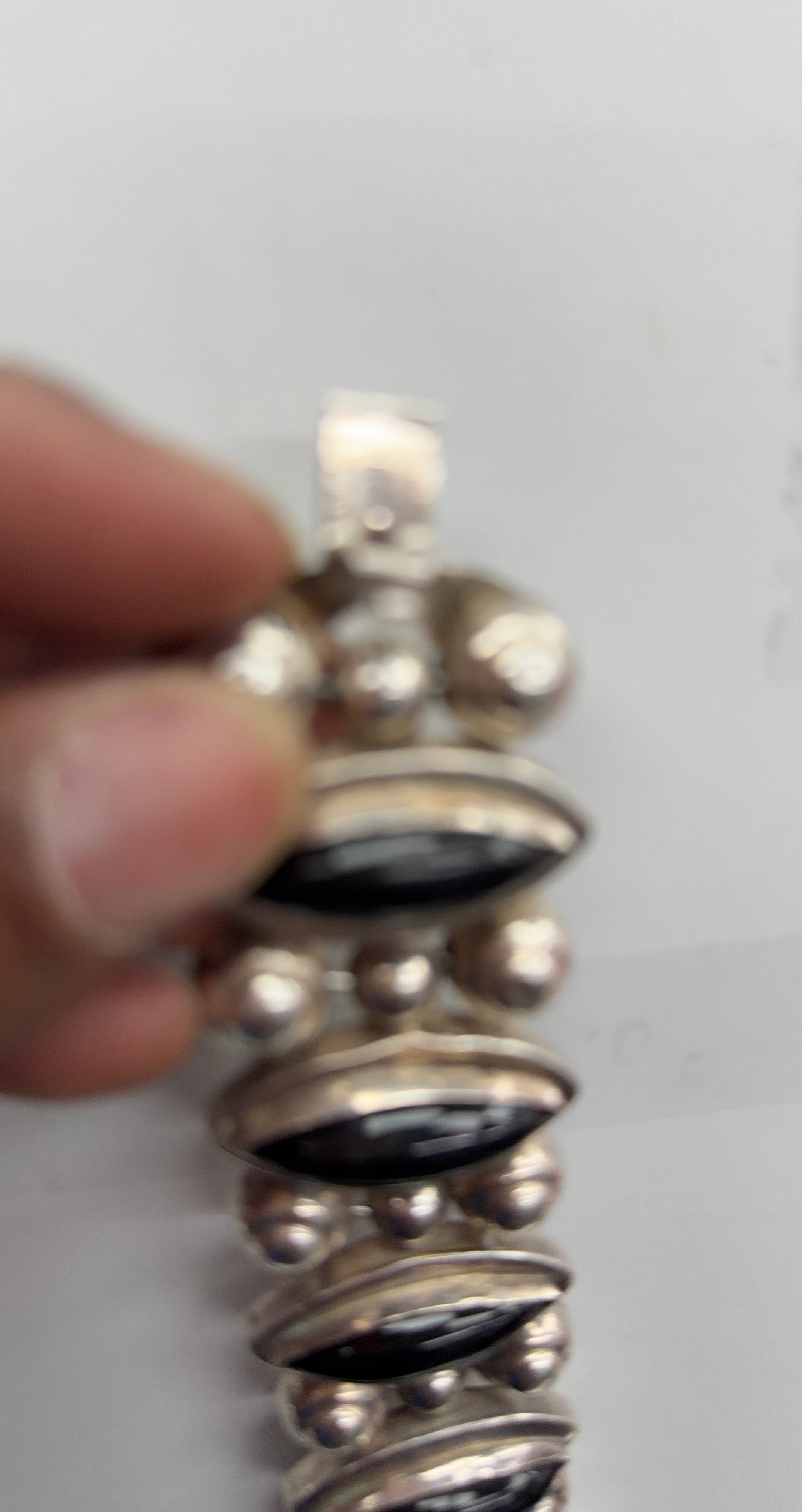 Silver Tone Bracelet with Black Stones