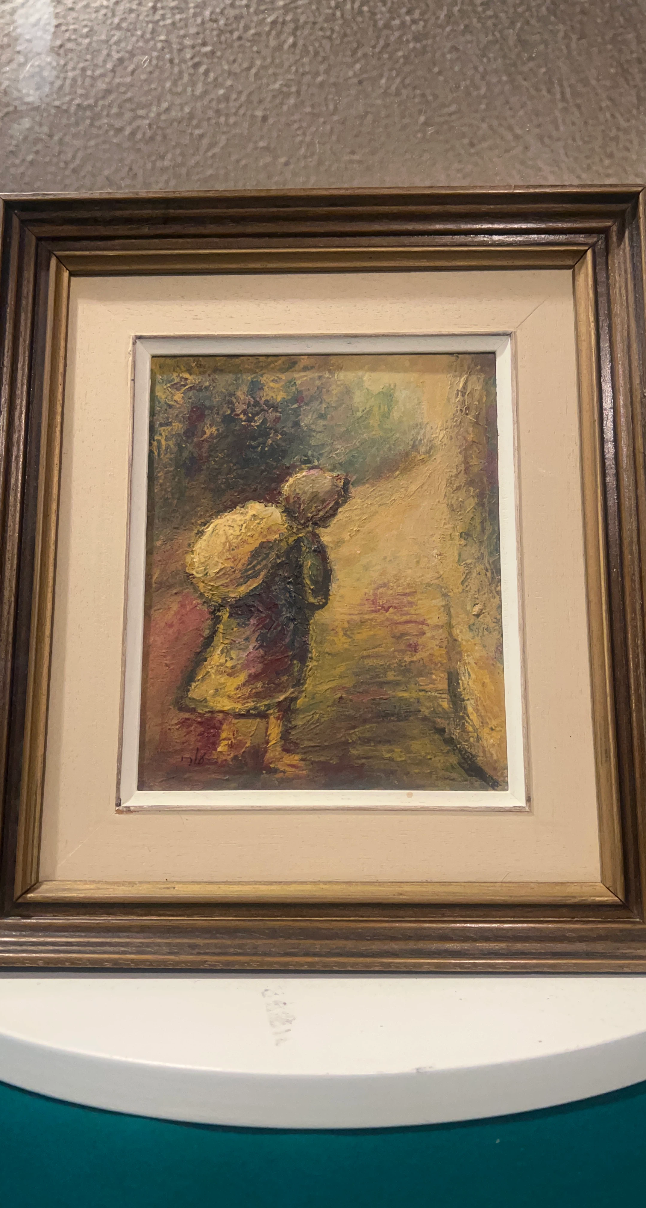 Framed Painting of a Person Carrying a Load