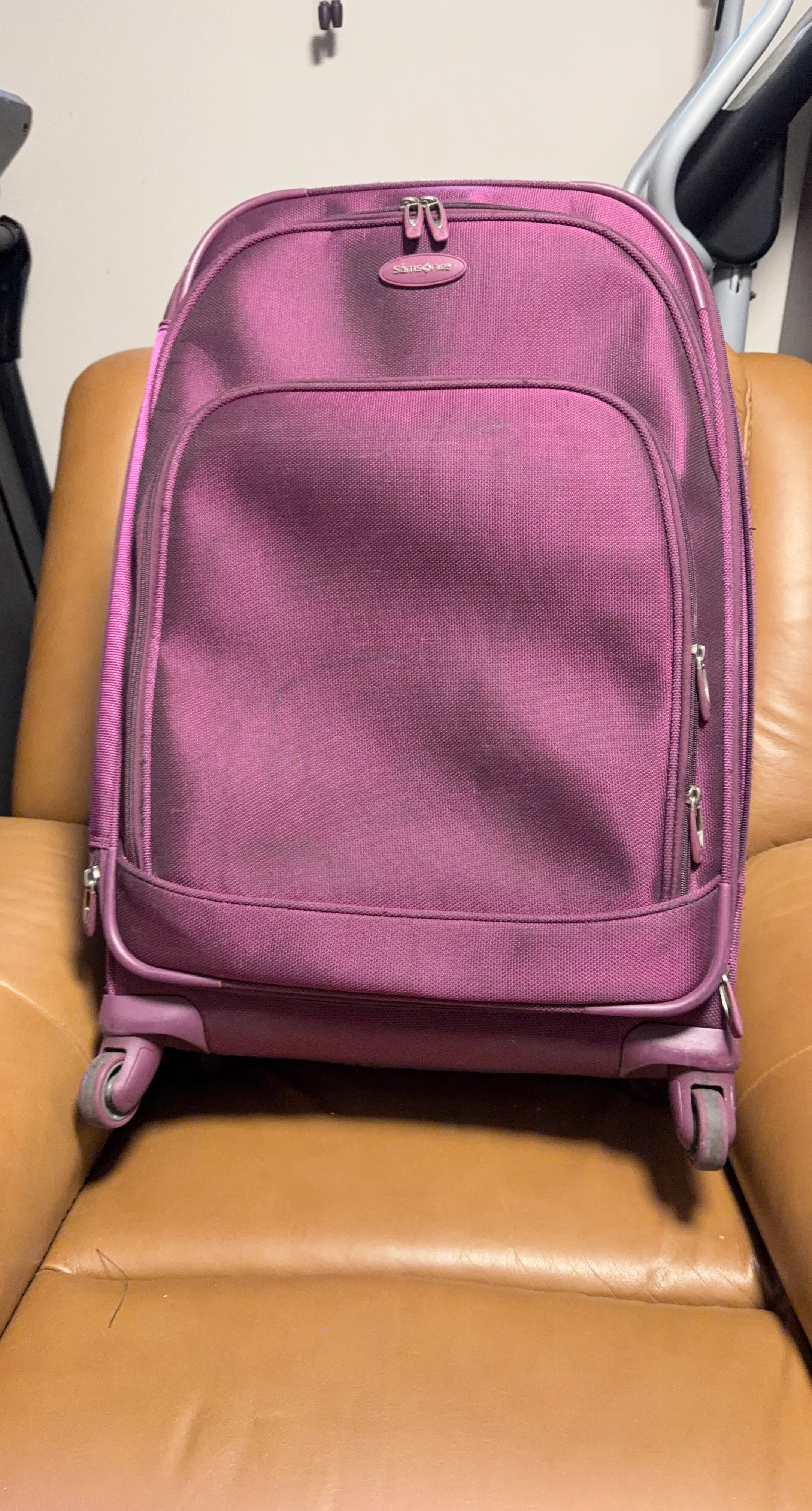 Samsonite Purple Rolling Suitcase