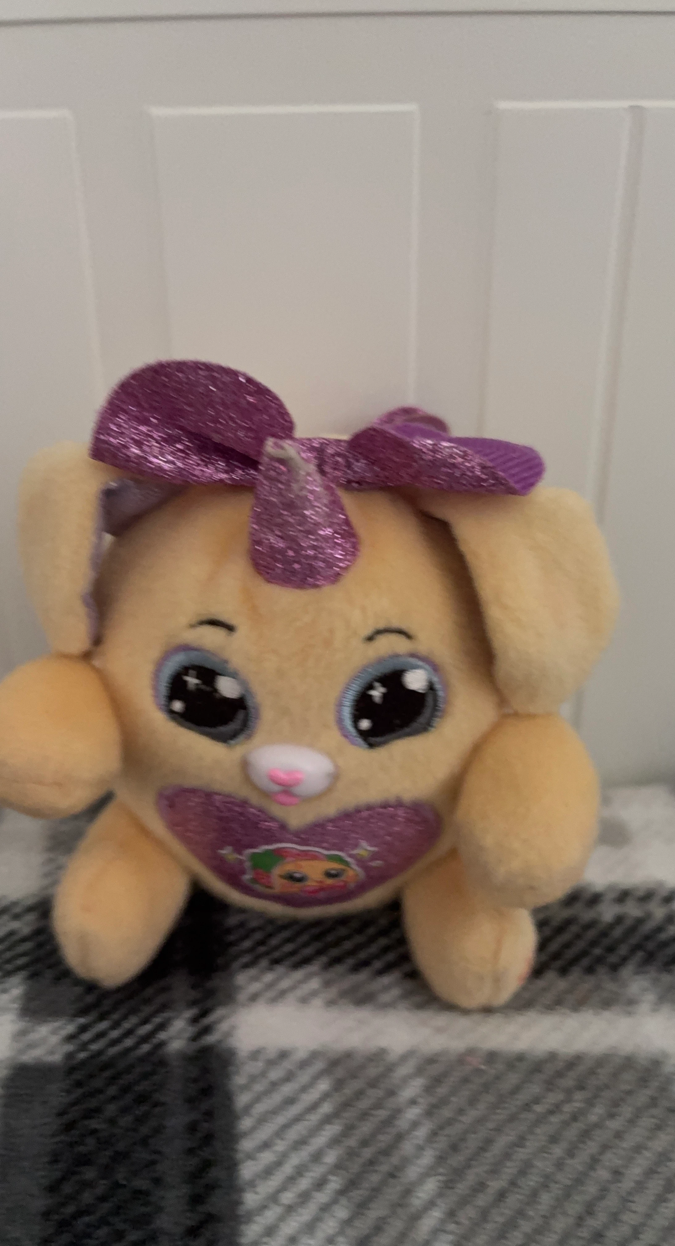 Plush Toy with Purple Bow