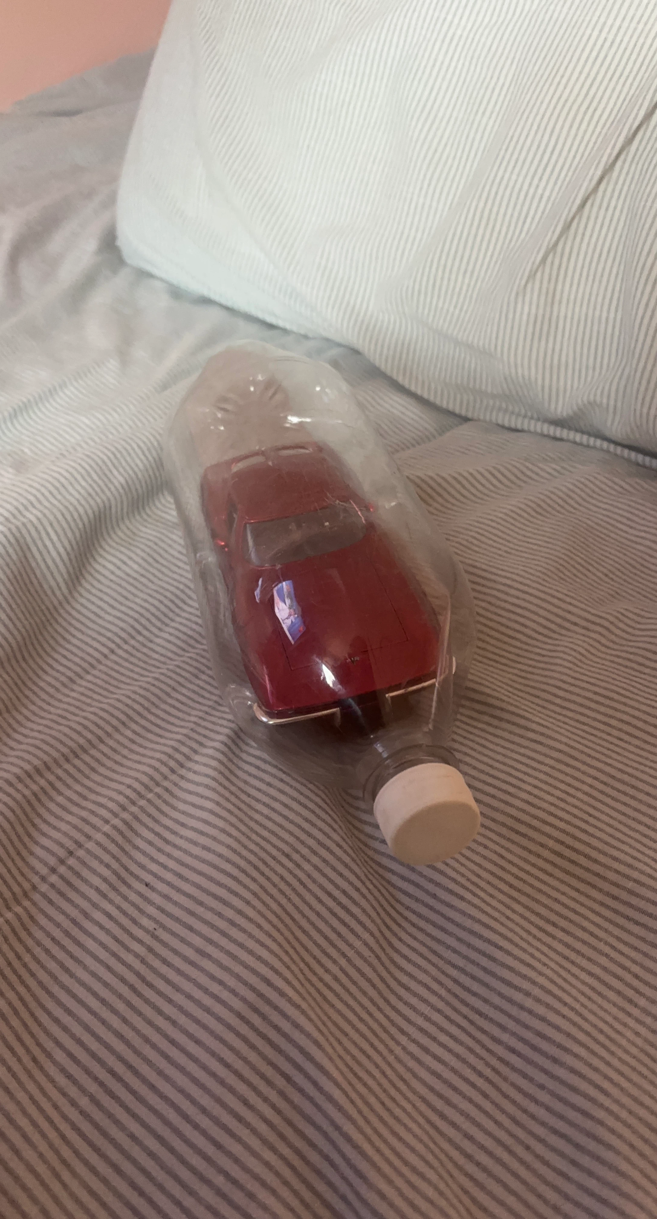 Red Toy Car in Bottle