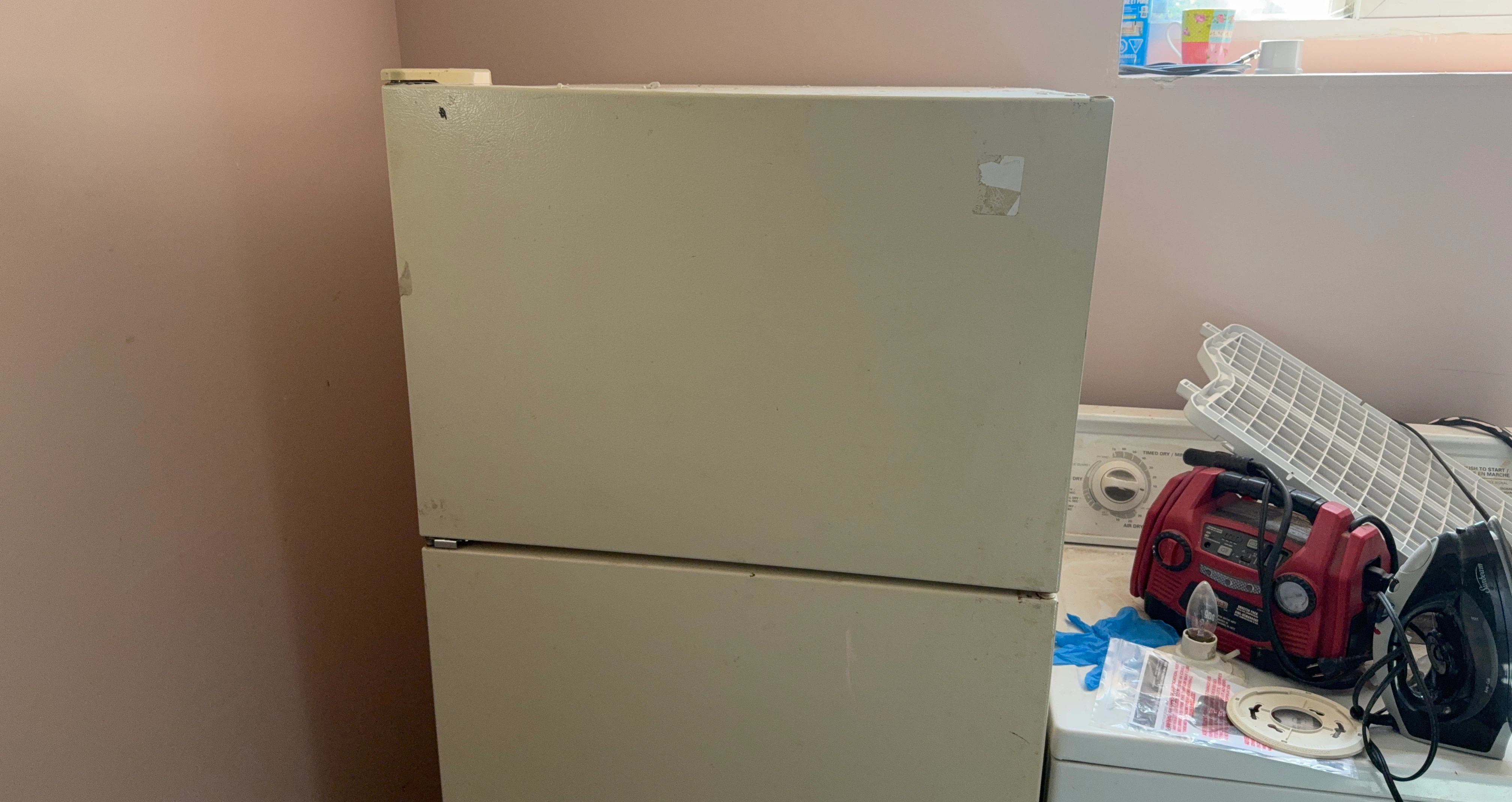 Cream coloured refrigerator
