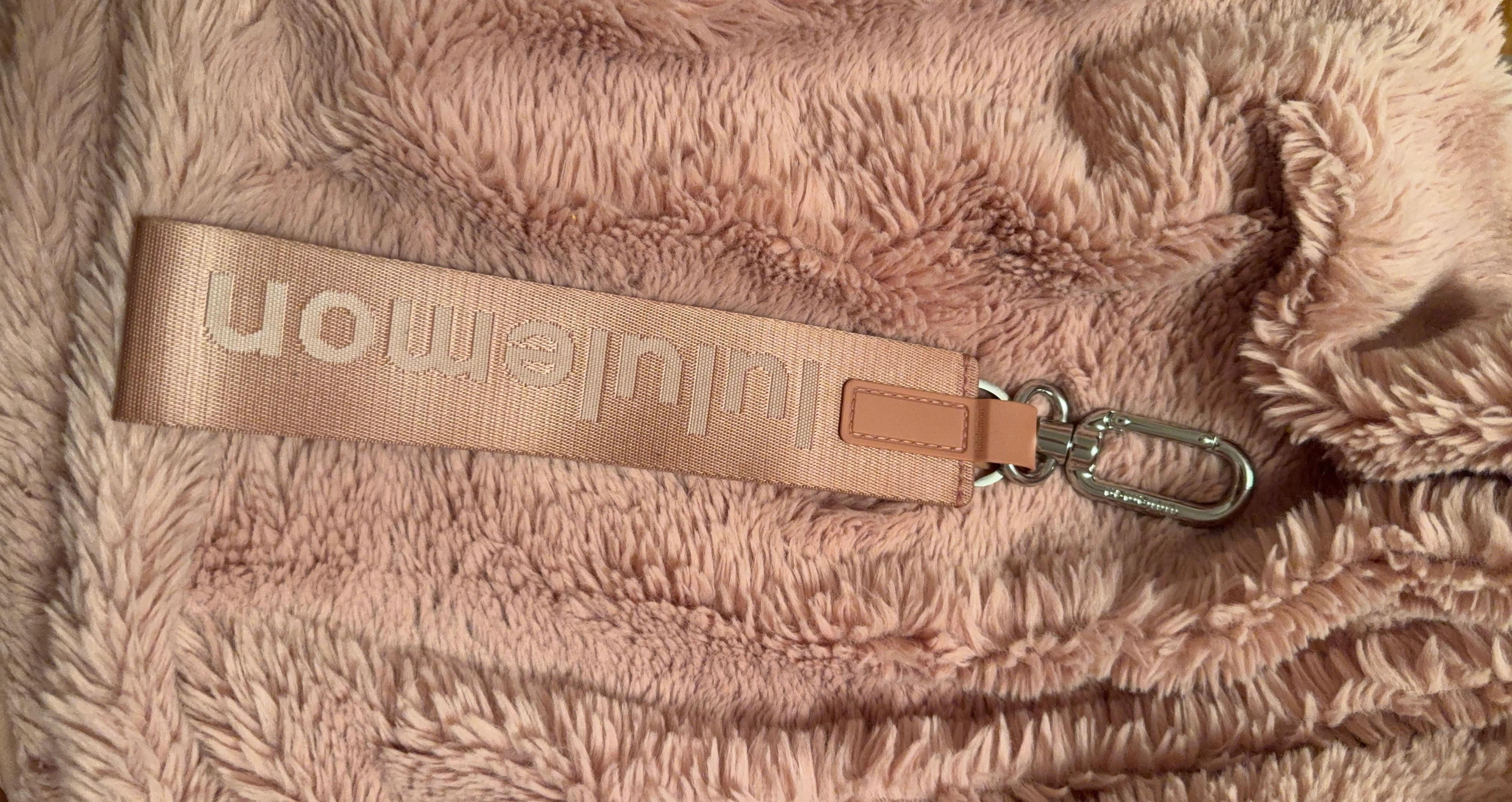 Pink lululemon key chain