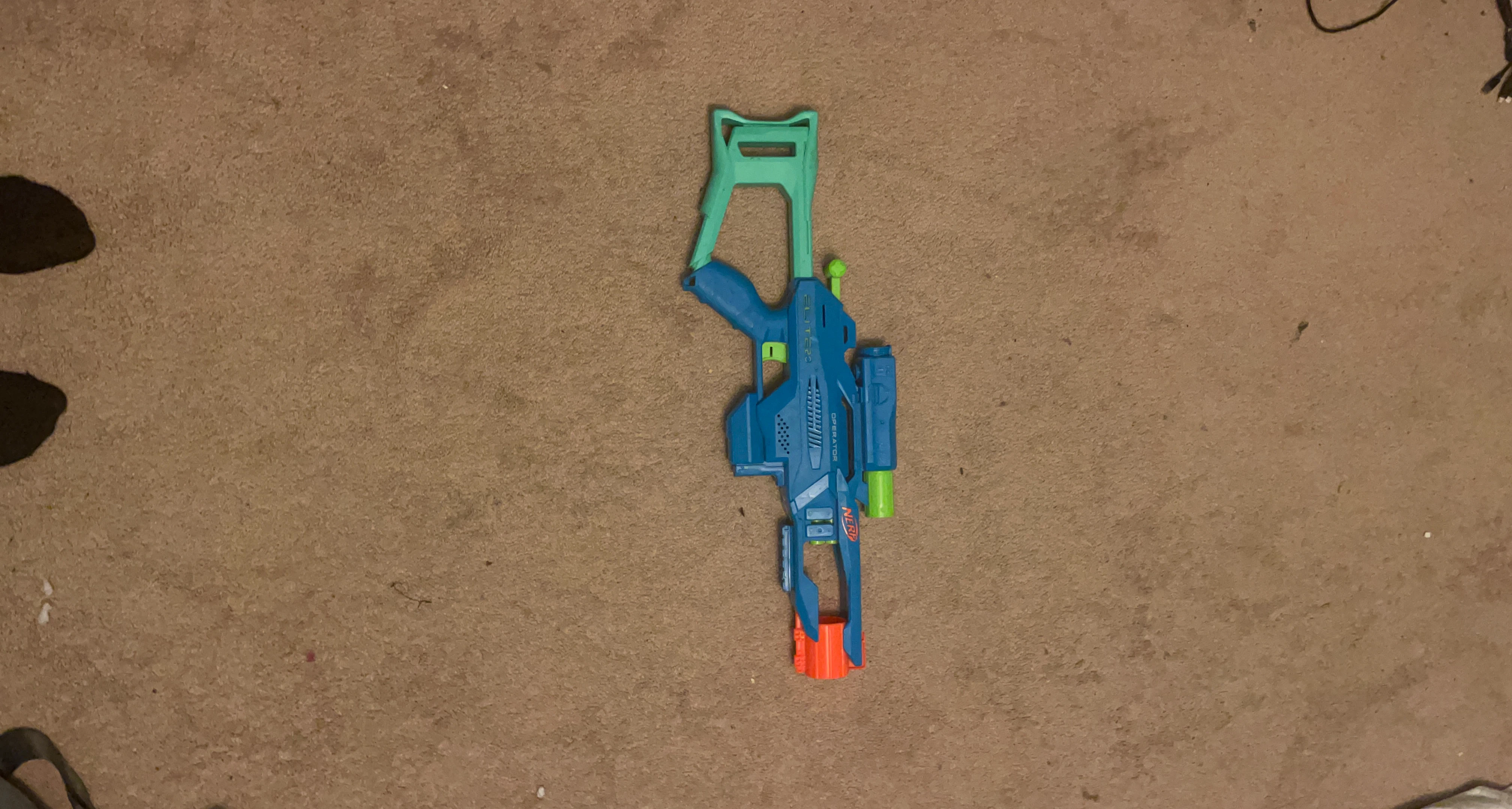 Blue and Green Toy Water Gun