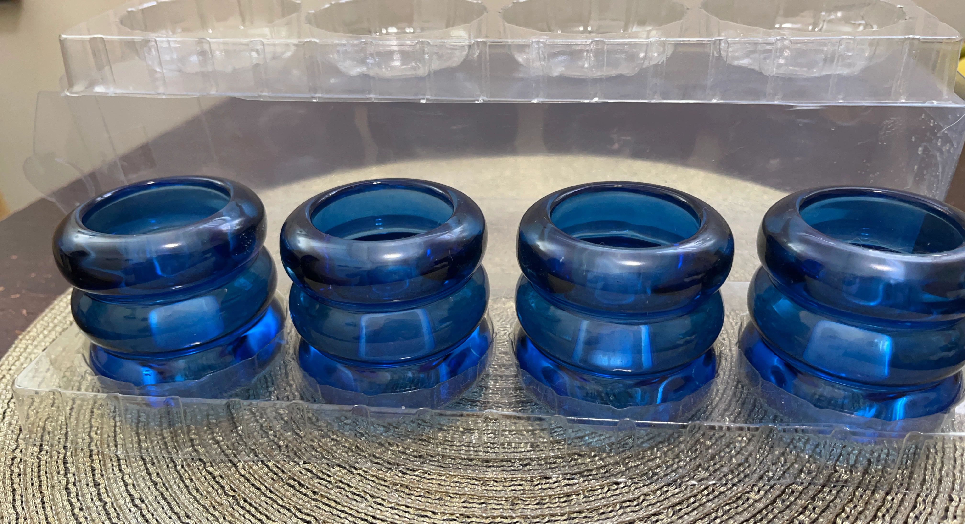 Set of 4 Blue Bubble Glass taper candle holders.