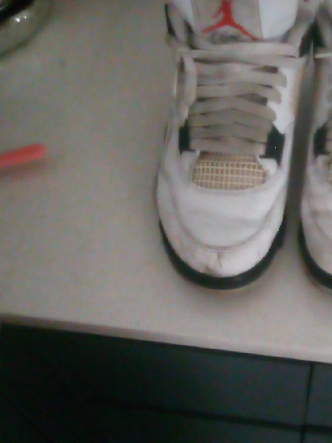 White Air Jordan 4 Retro Sneakers