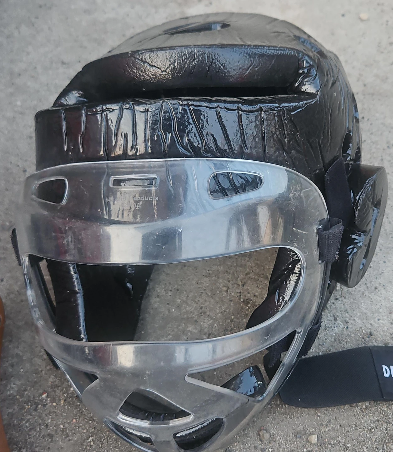 Black martial arts headgear with face shield