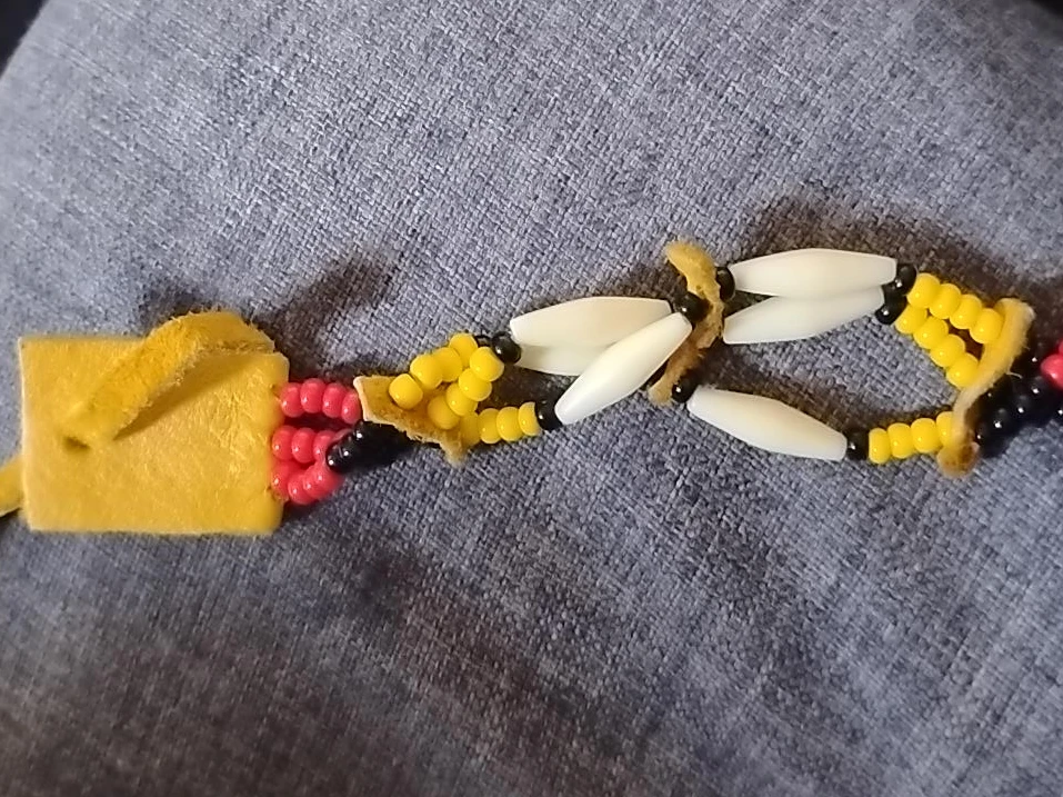 Beaded bracelet with Yellow Faux Suede Accent