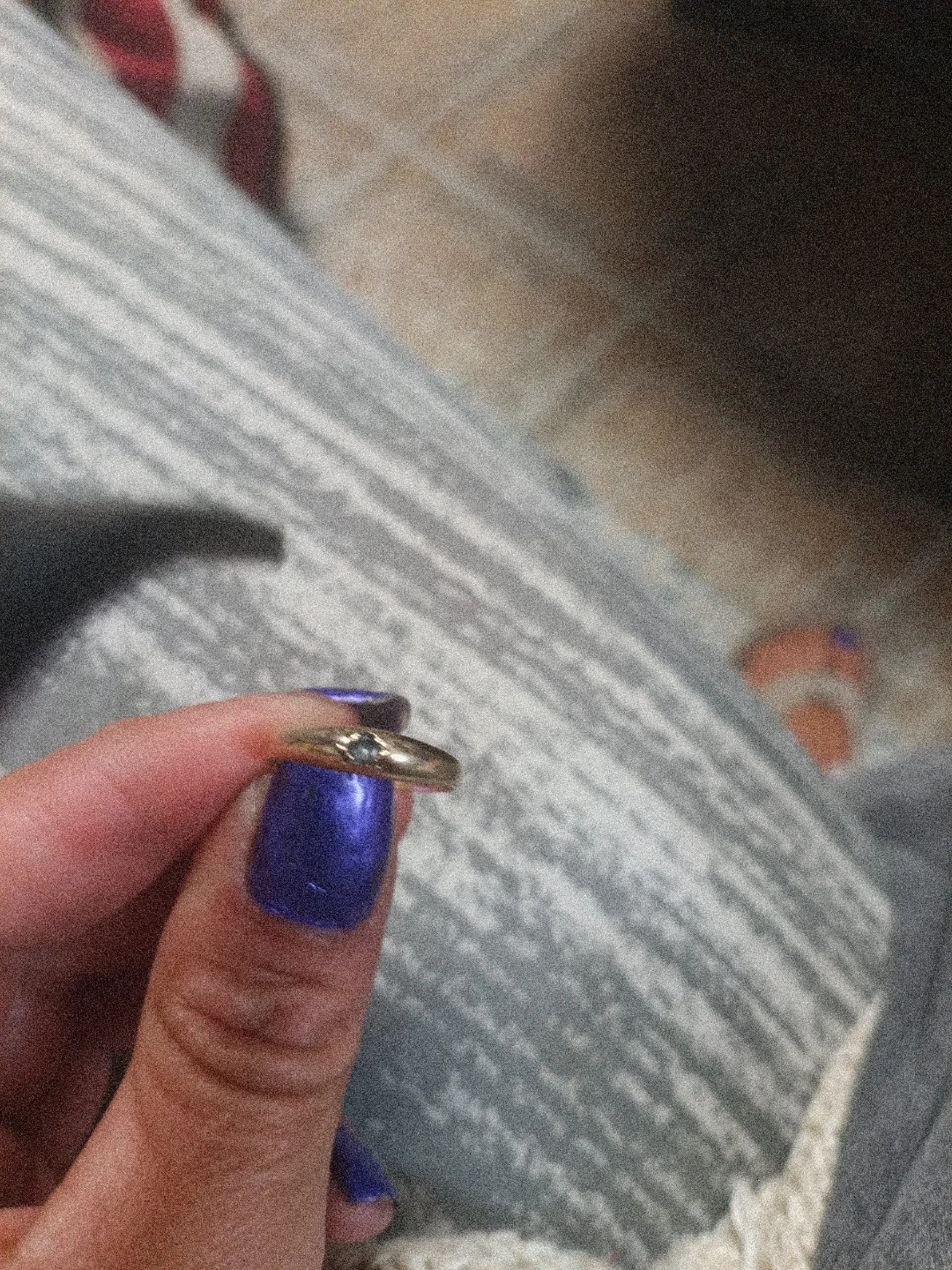 Gold-toned ring with small stone