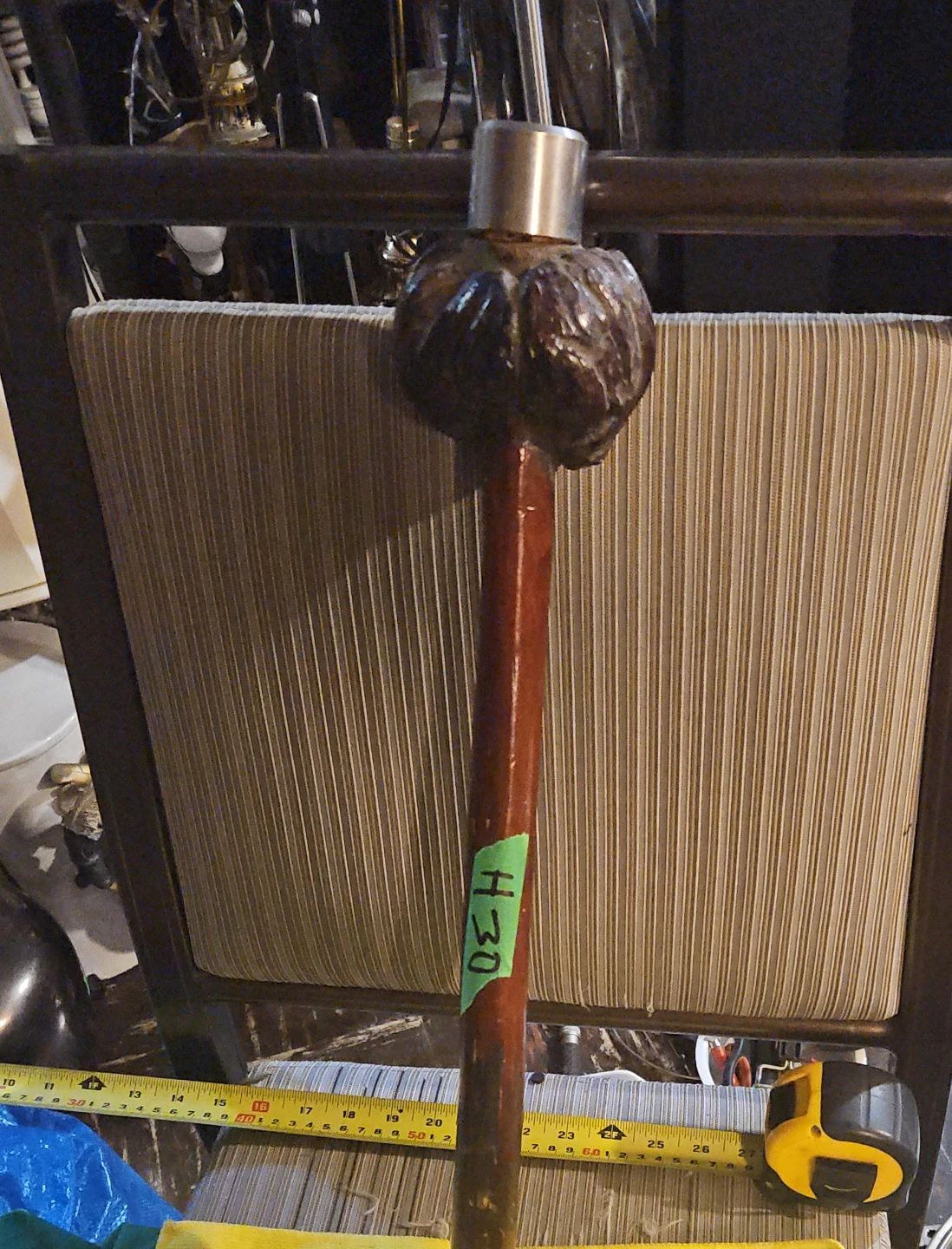 Carved wooden cane with metal cap