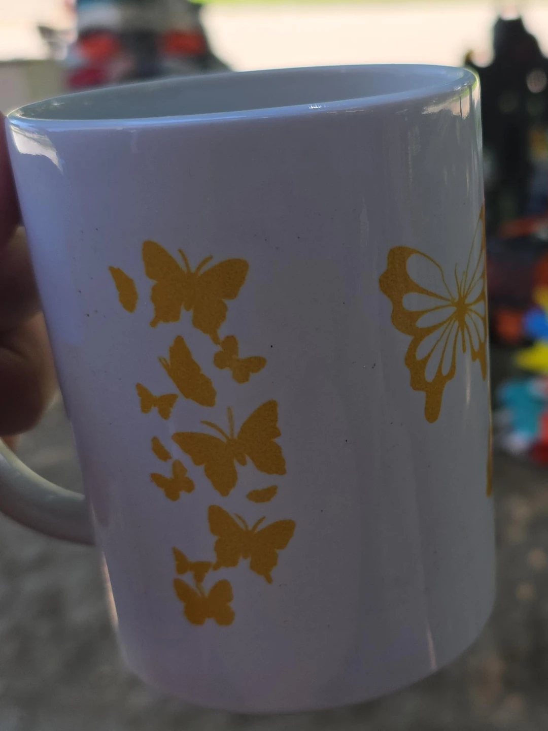 White mug with yellow butterflies