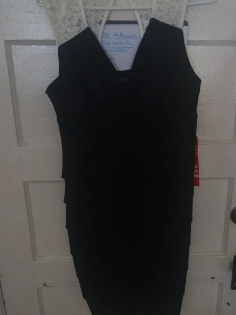 Black tiered dress with lace trim