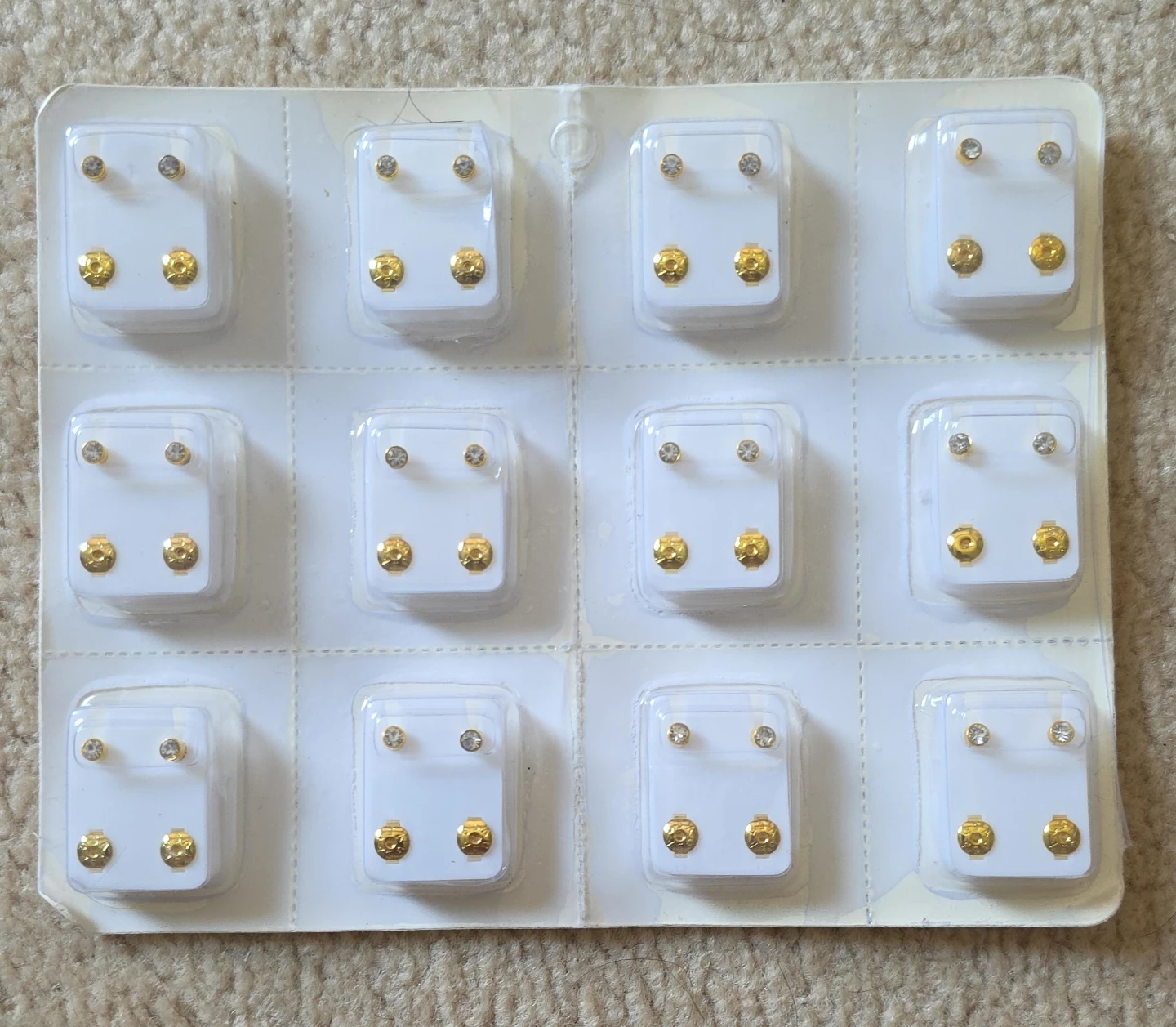 12 Pairs of Gold Tone Stud Earrings