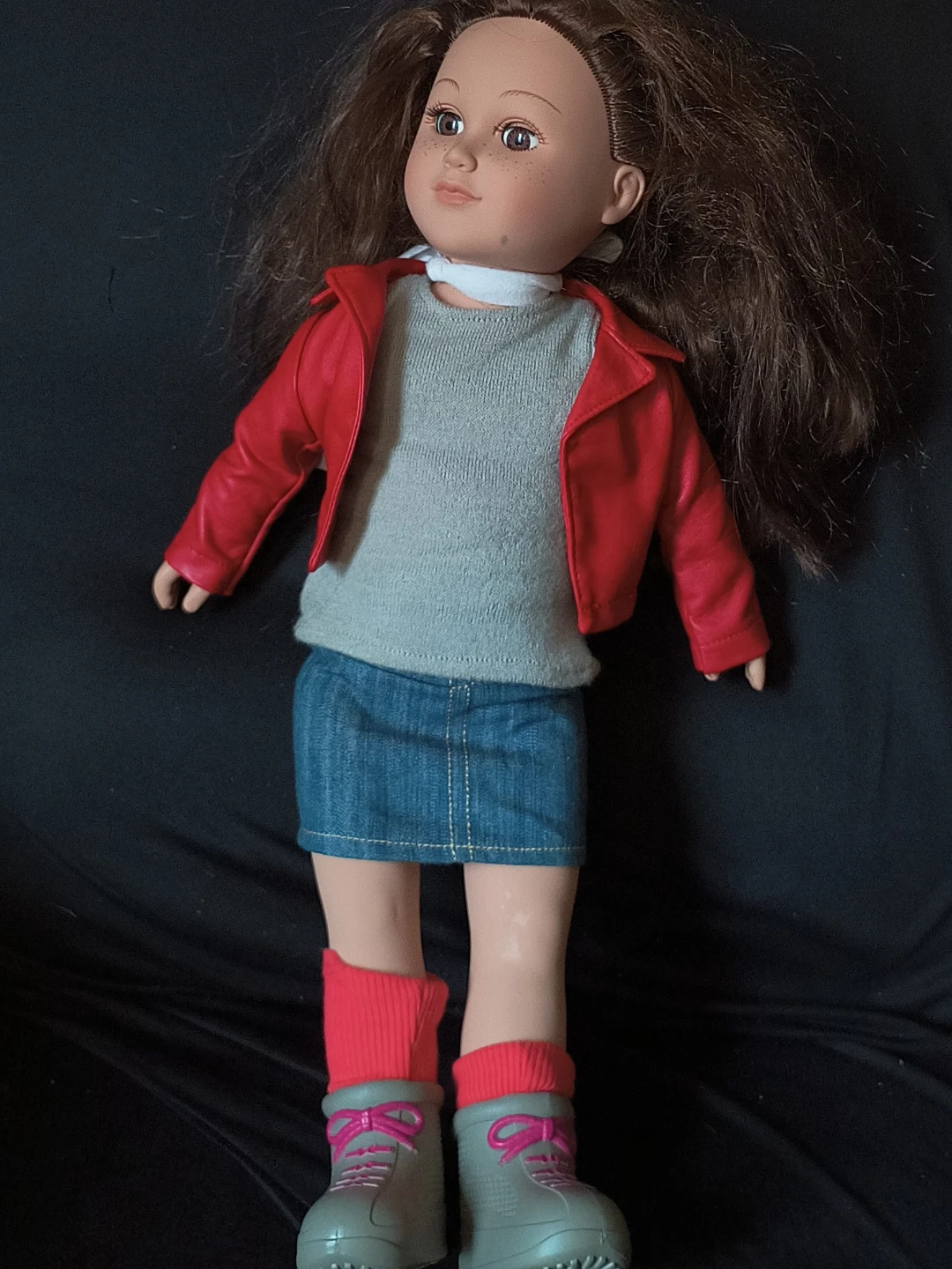 Doll with Red Jacket and Denim Skirt